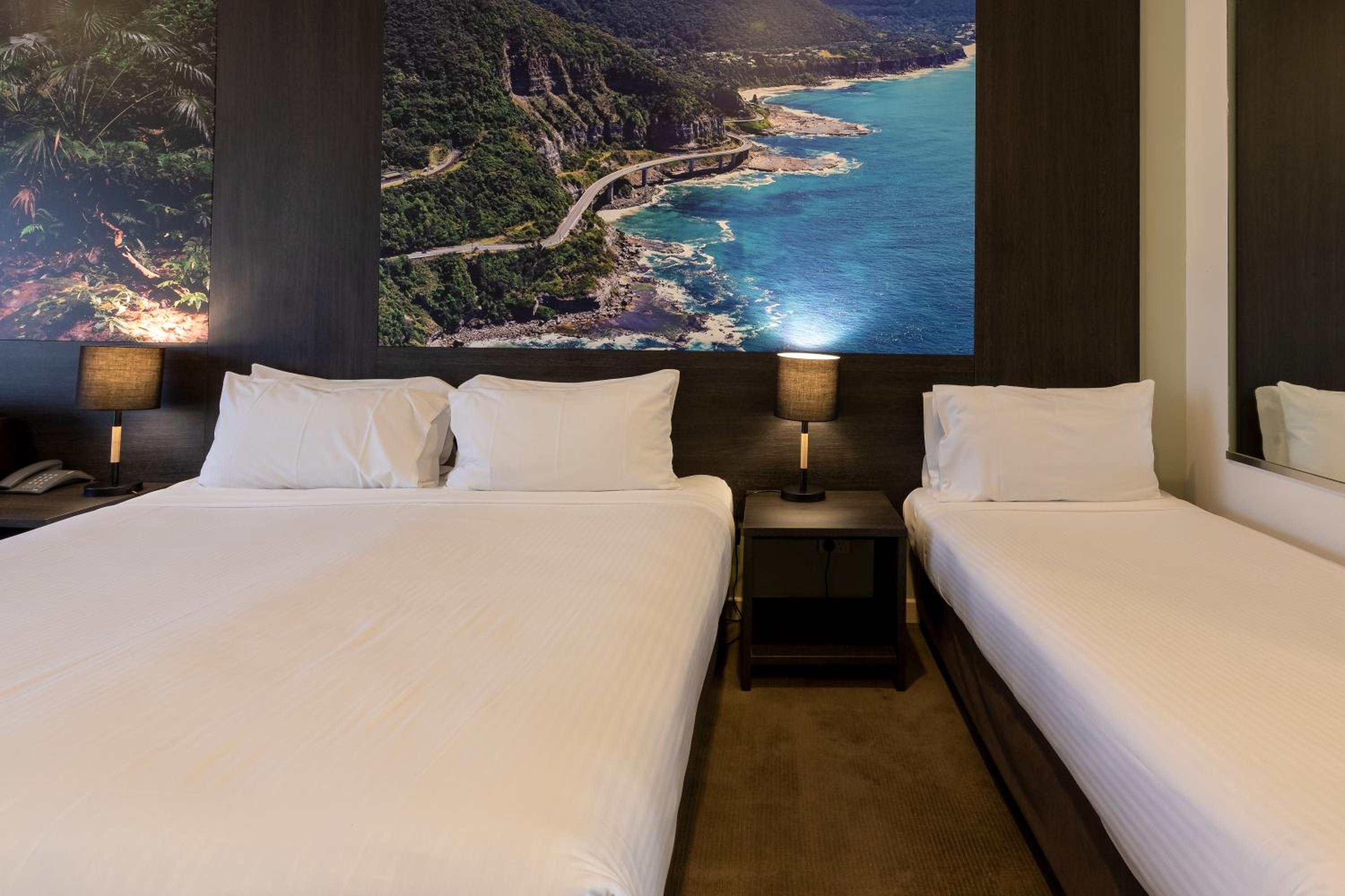 Standard Room with One King and One Single Bed - Photo 1