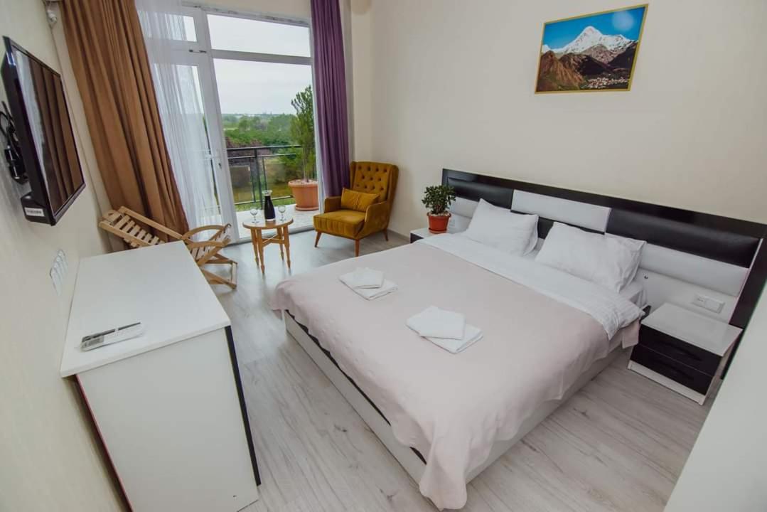 Double Room with Balcony (2 Adults + 1 Child)