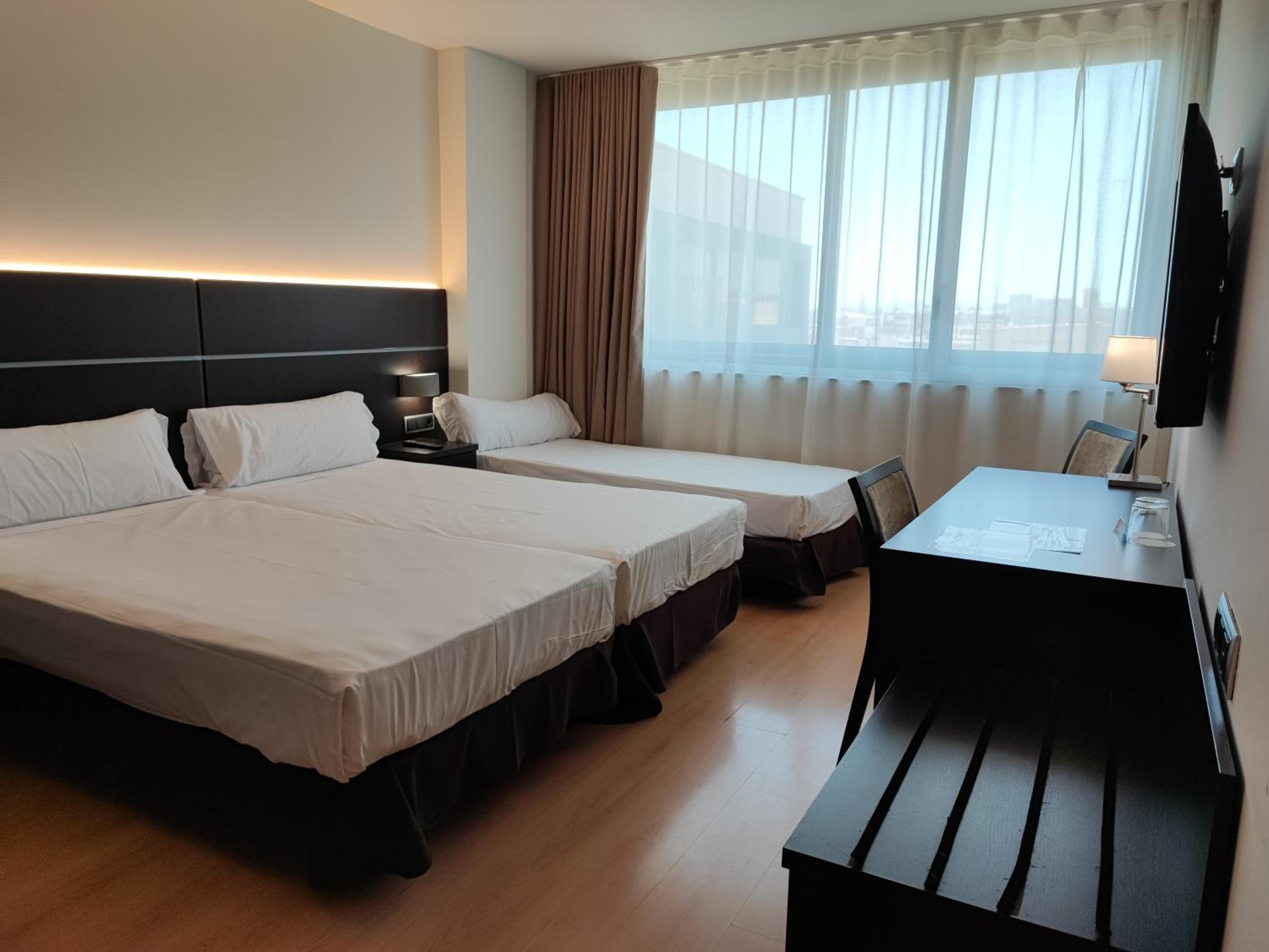 Triple Room - Photo 1