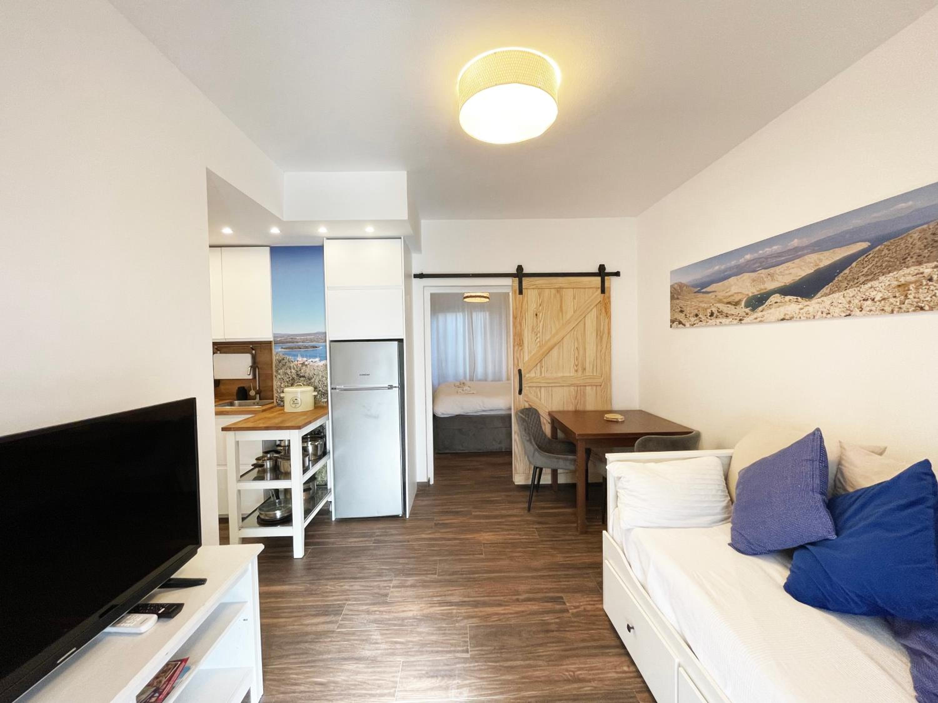One-Bedroom Apartment with Terrace and Garden View