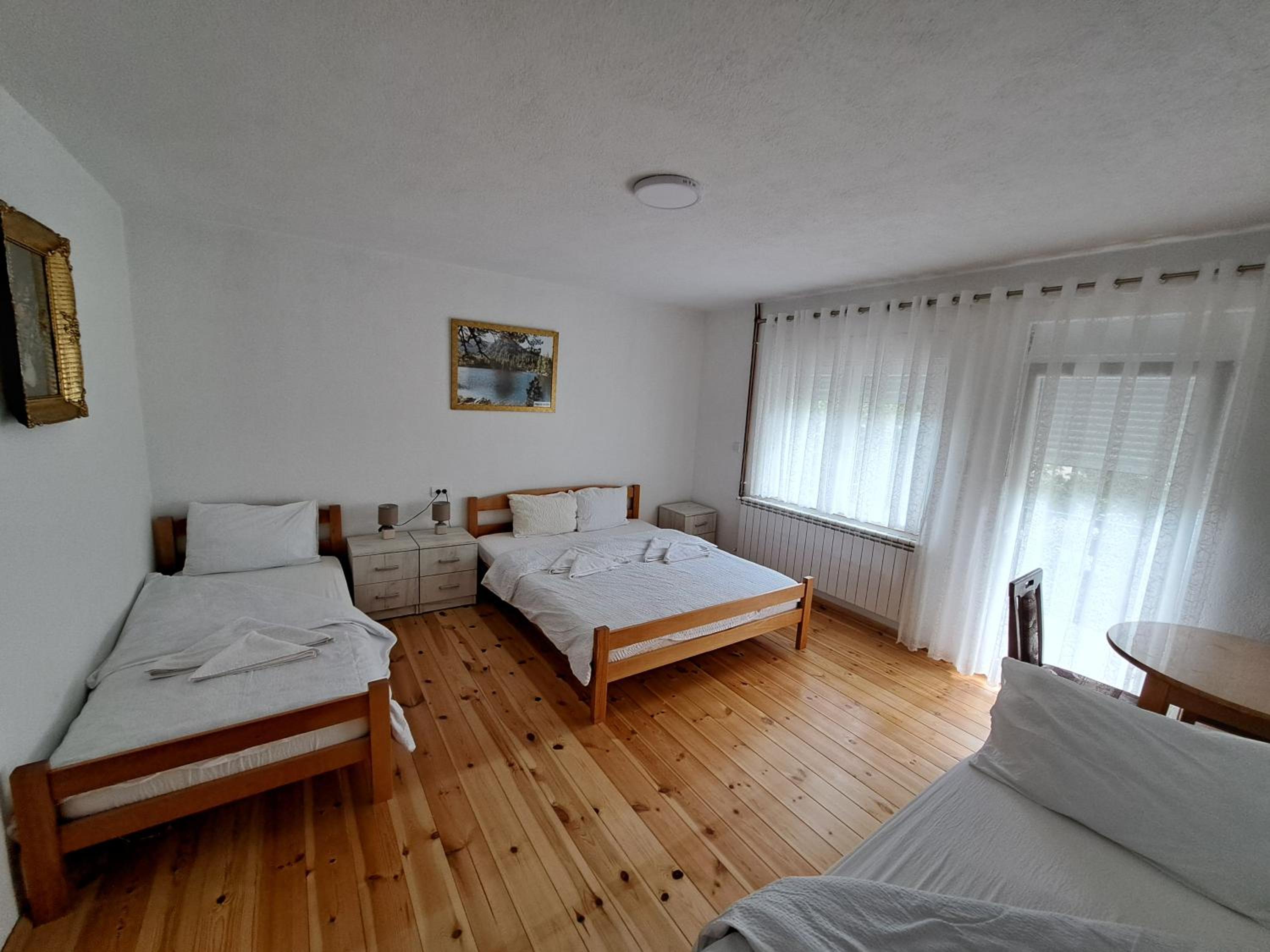 Economy Quadruple Room with Shared Bathroom