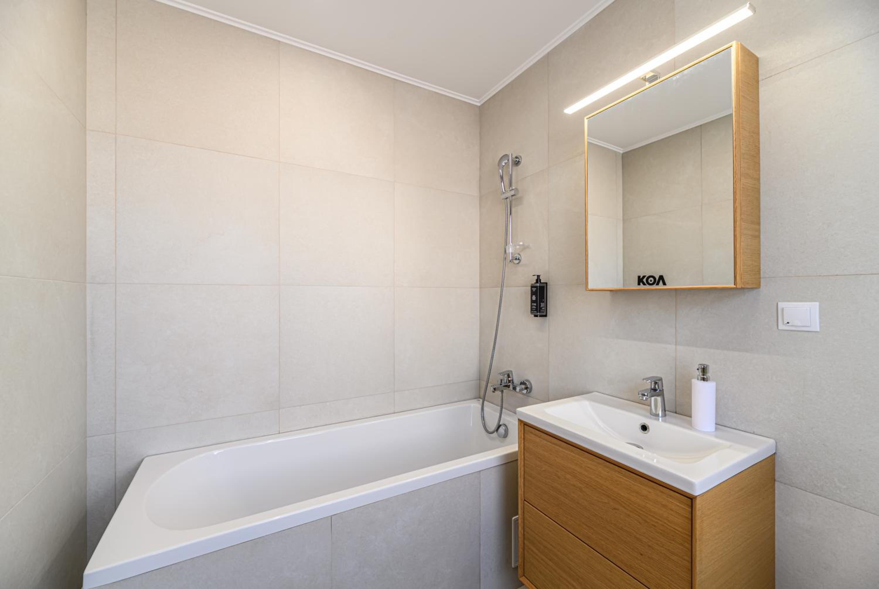 Three-Bedroom Apartment - Photo 3