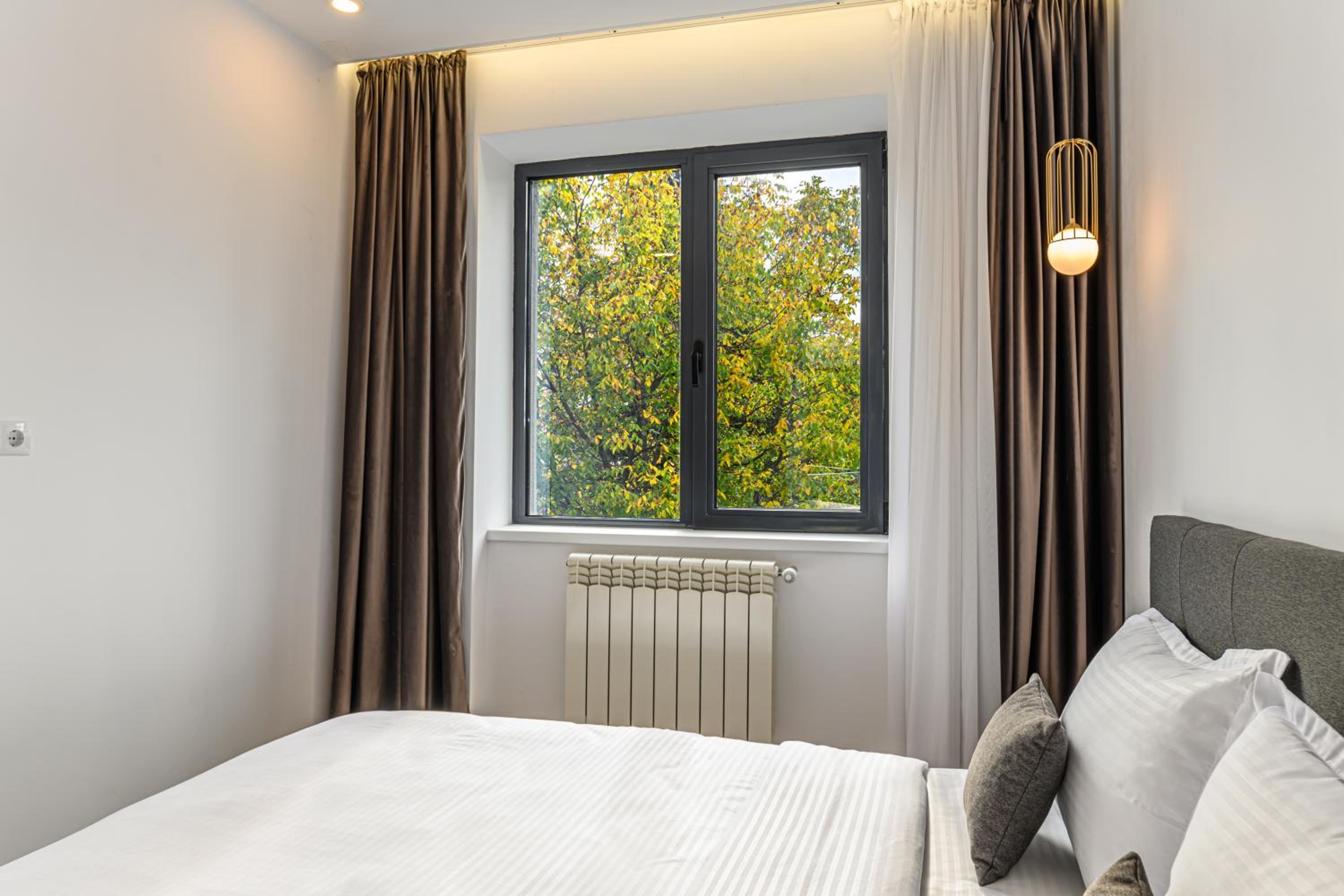 Three-Bedroom Apartment - Photo 6