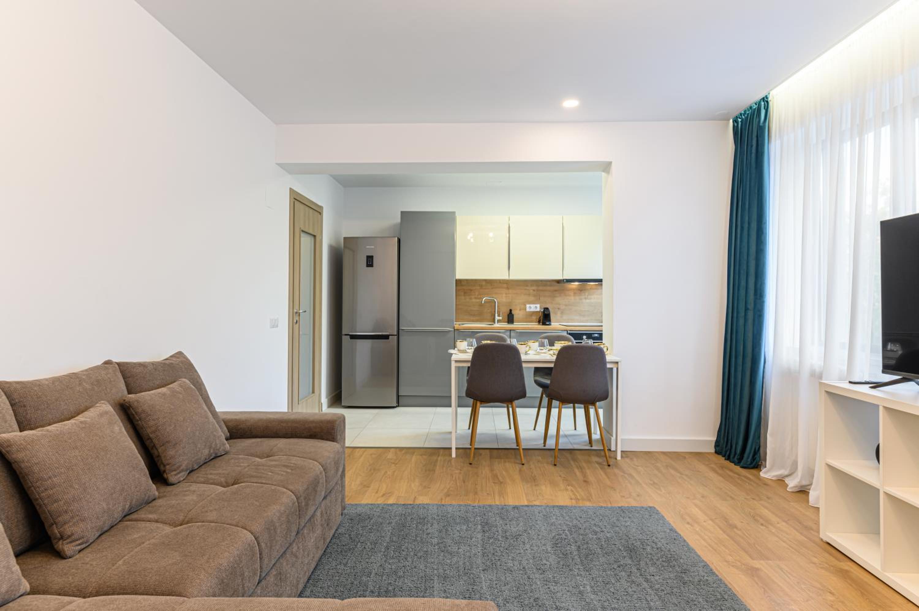 Three-Bedroom Apartment - Photo 12