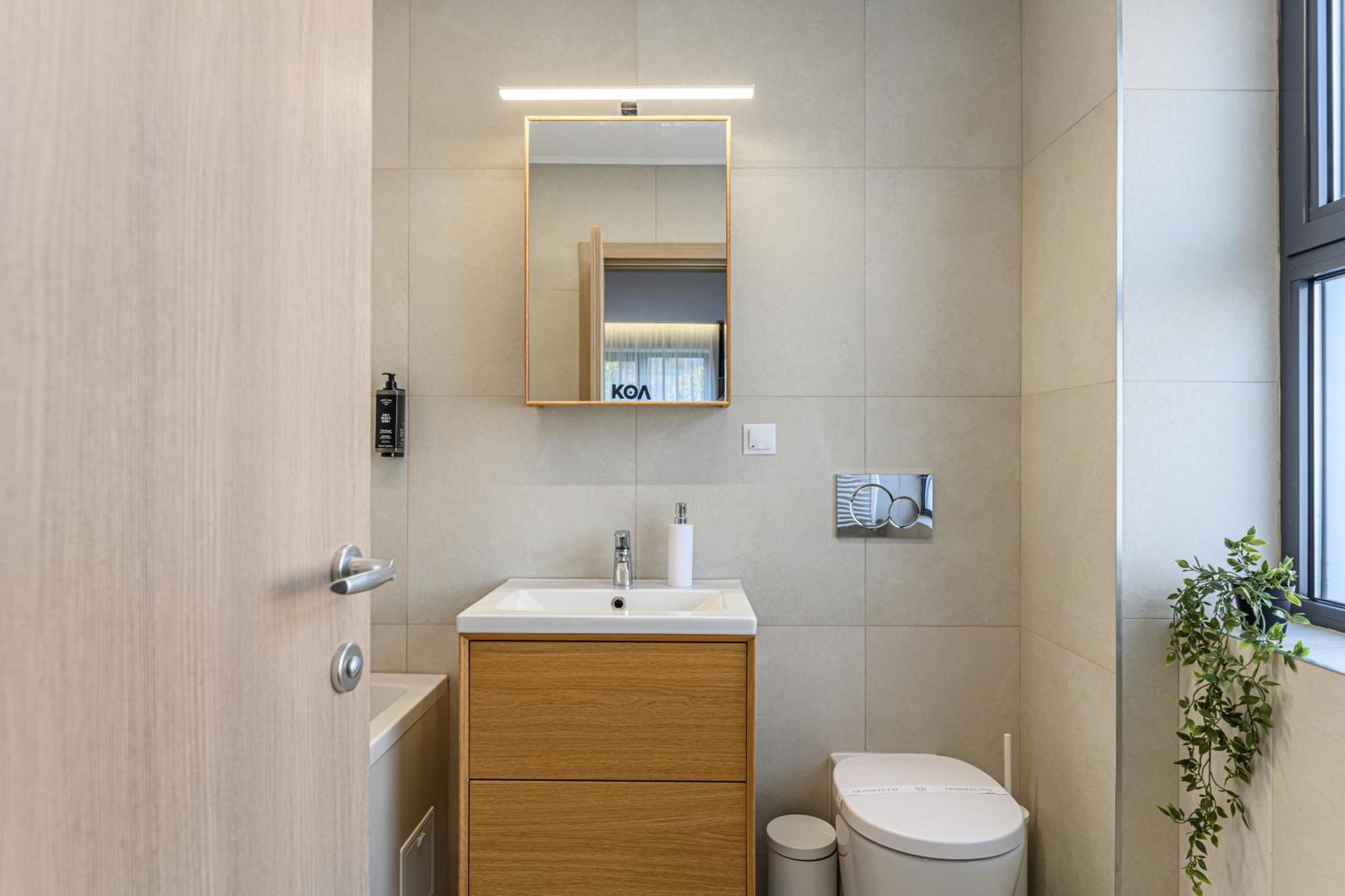 Three-Bedroom Apartment - Photo 28