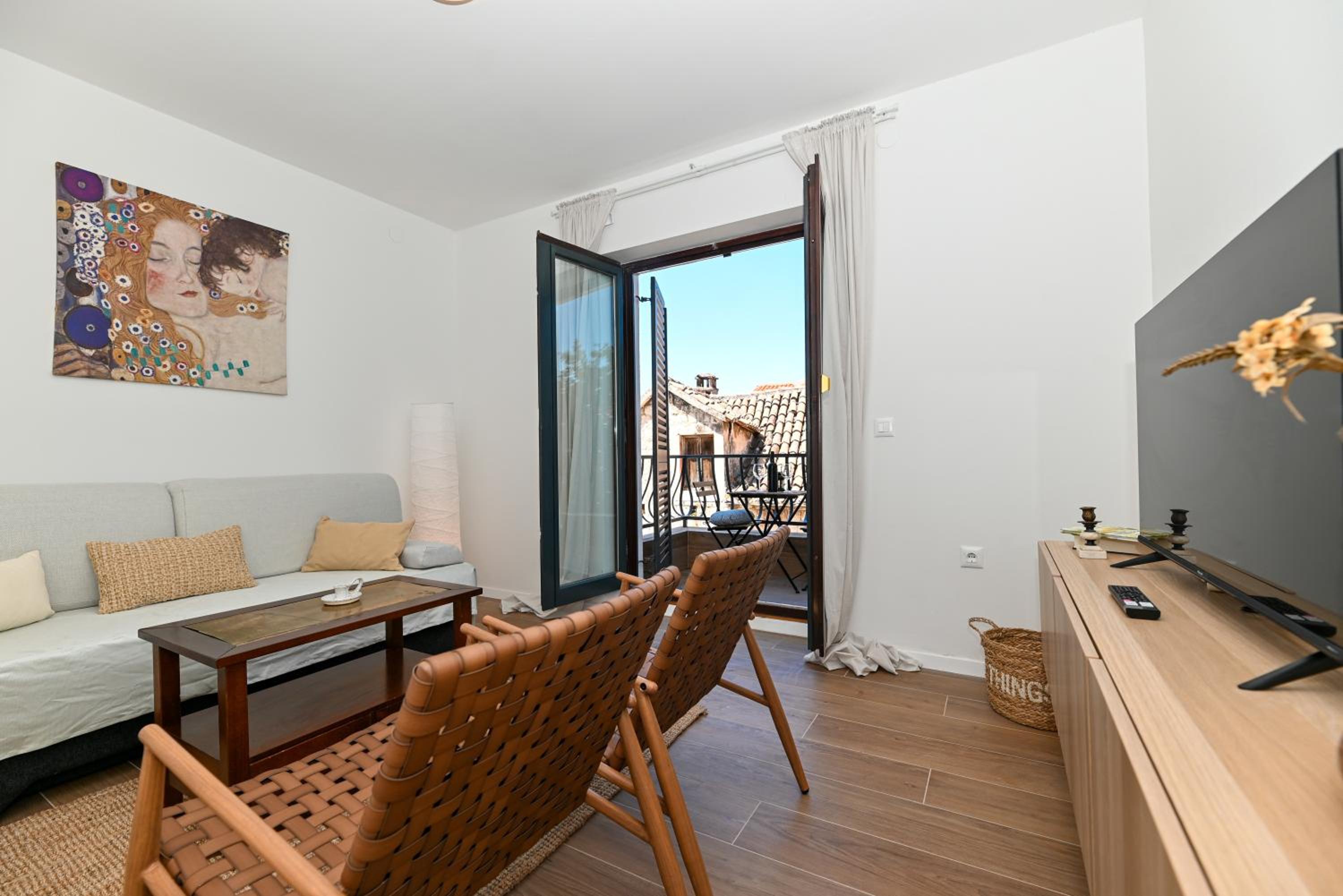 One-Bedroom Apartment with Balcony and City View