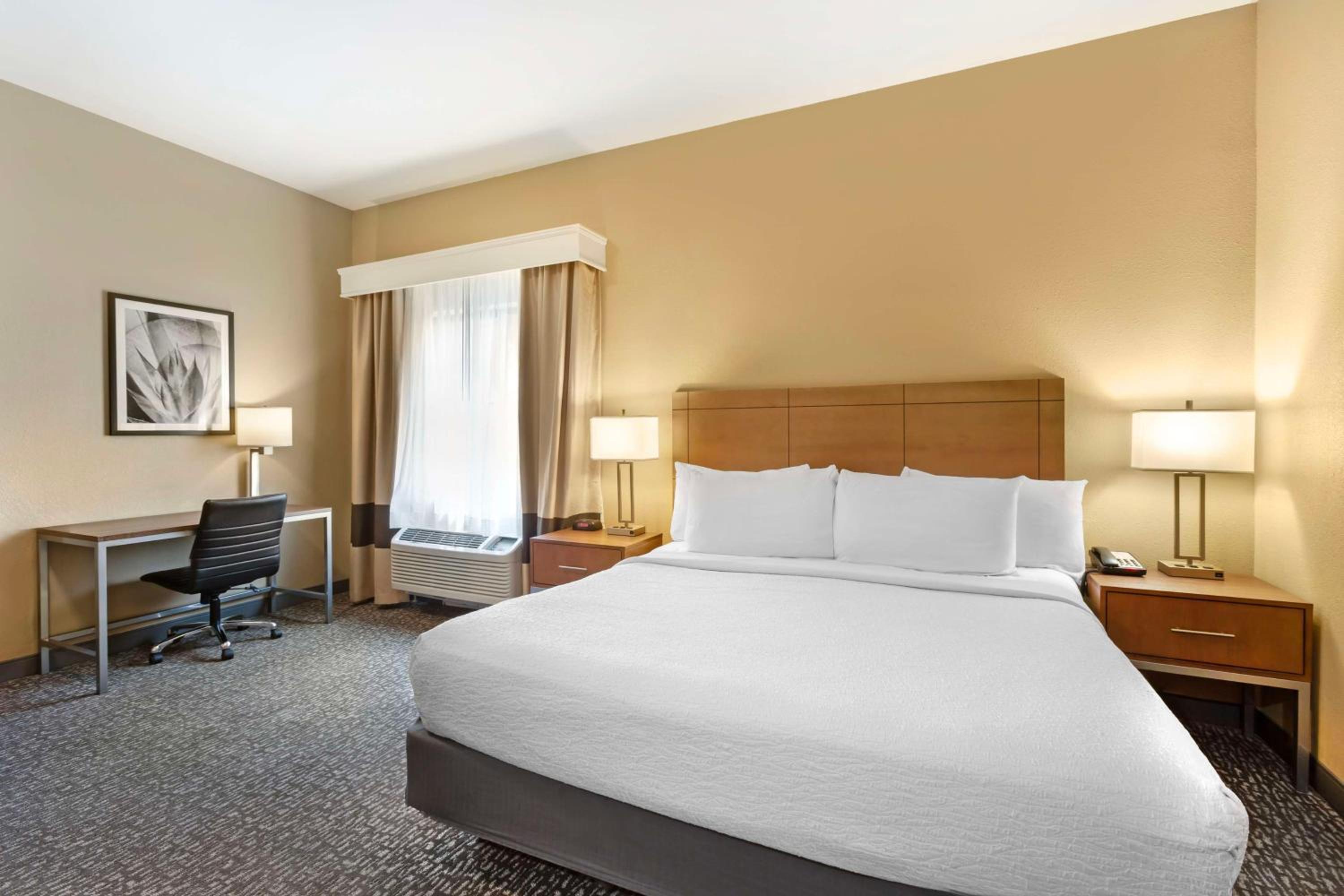 Suite With One King Bed And Two Double Beds