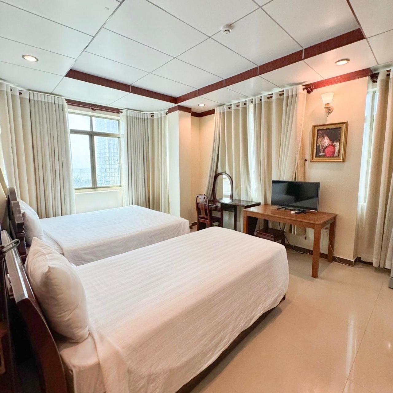 Deluxe Triple Room - Photo 1