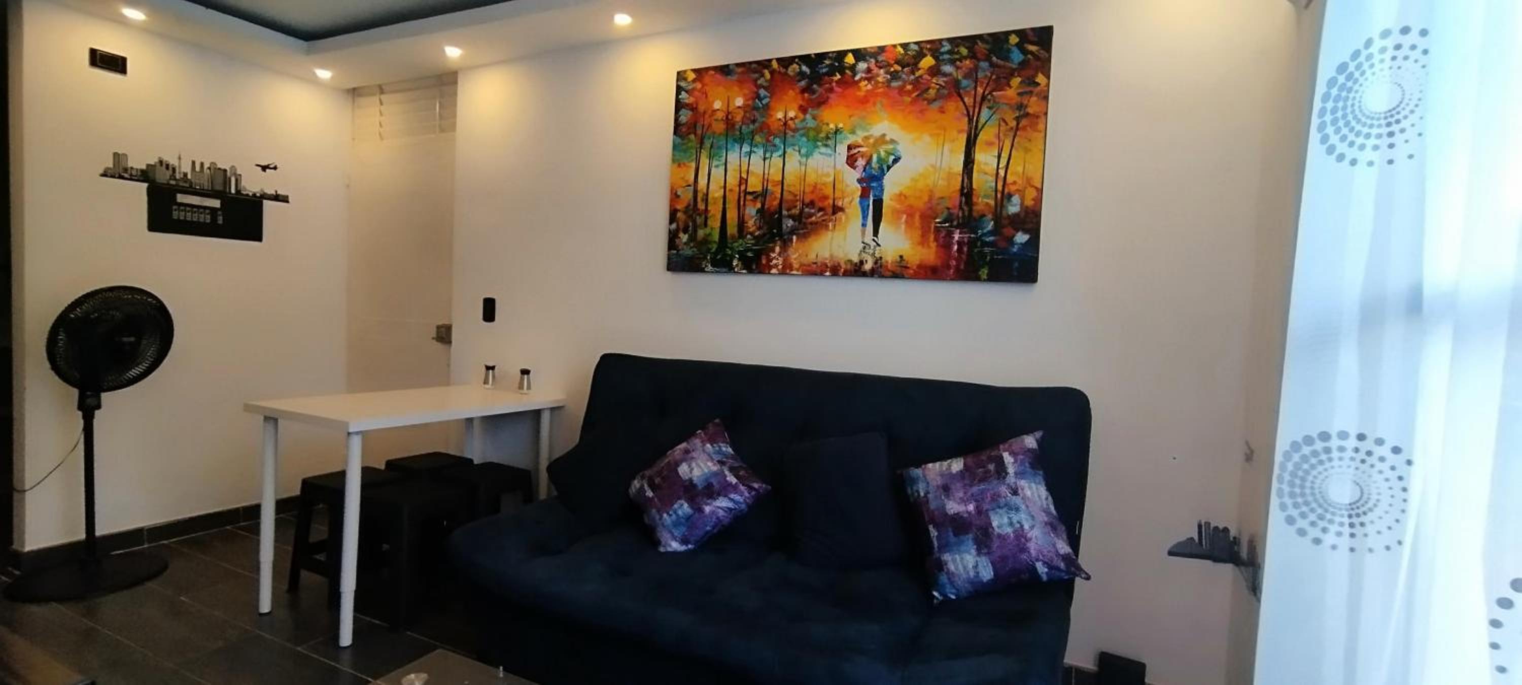 Three-Bedroom Apartment photo 2