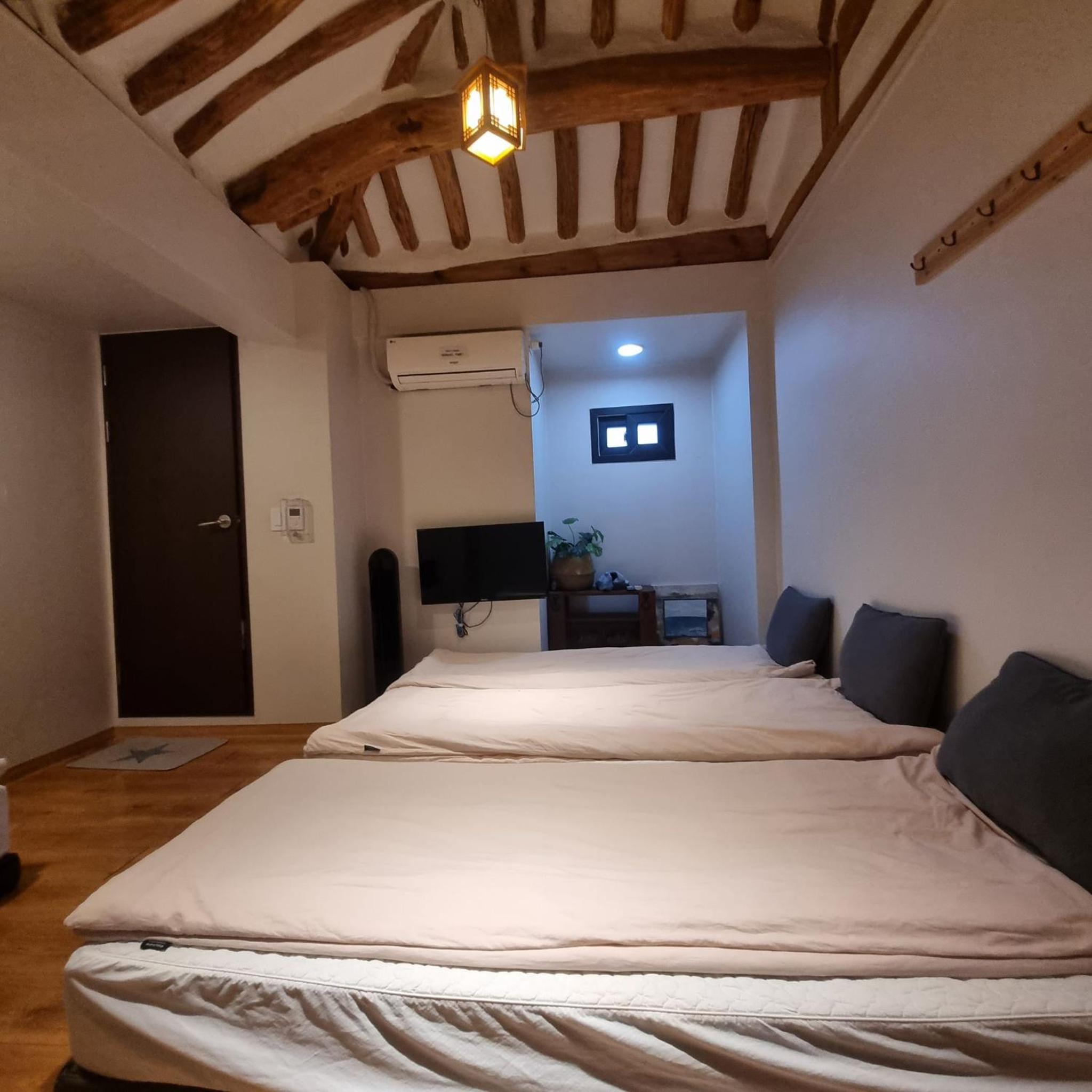 Four-Bedroom House - Photo 46