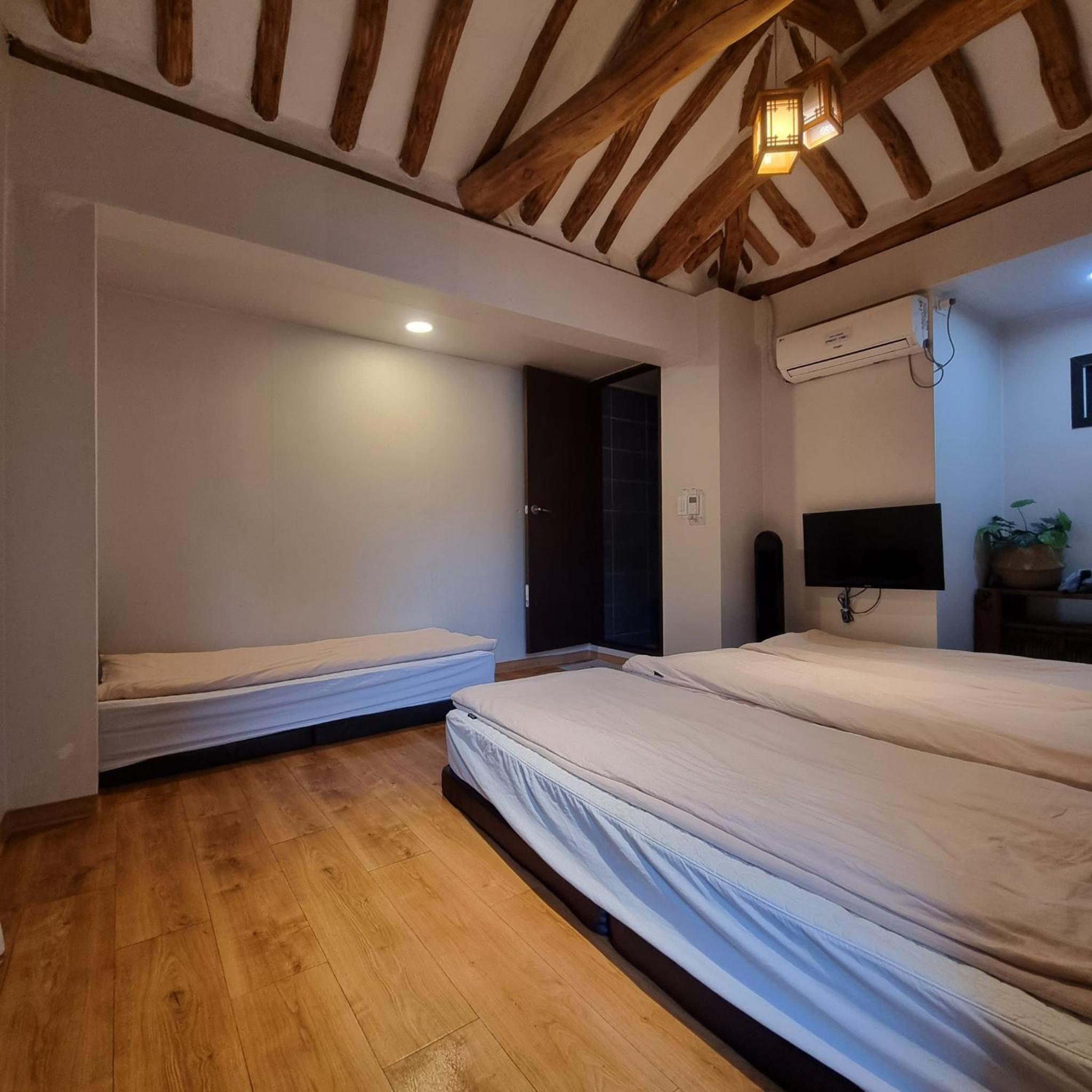 Four-Bedroom House - Photo 48