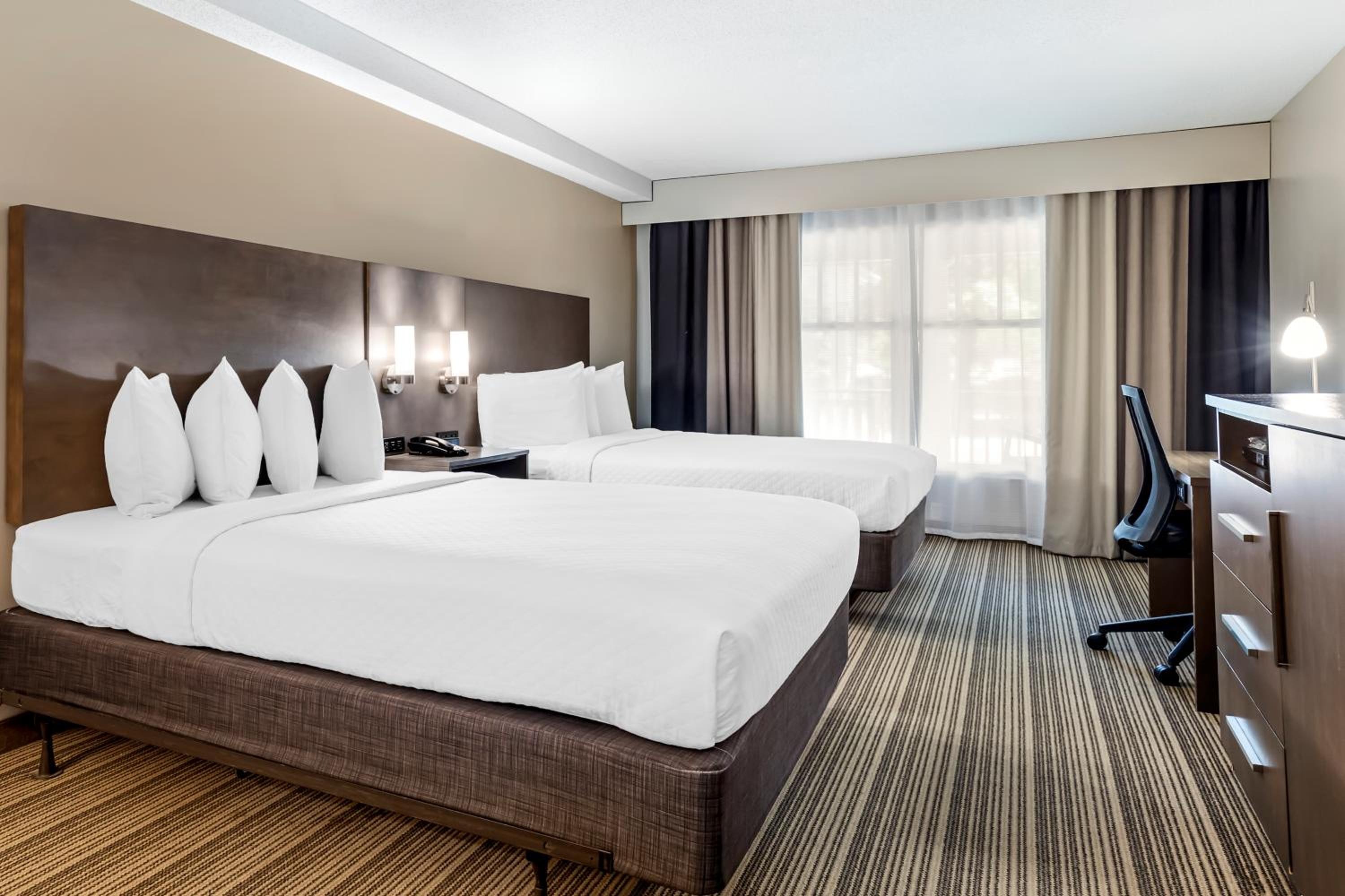 Queen Room with Two Queen Beds - Photo 1