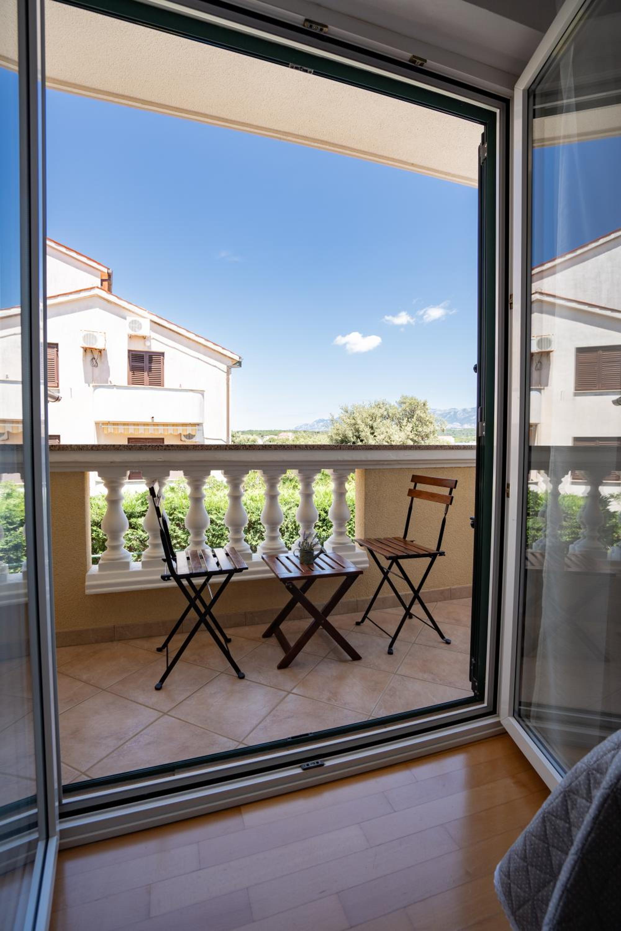 Family Room with Balcony - Photo 6