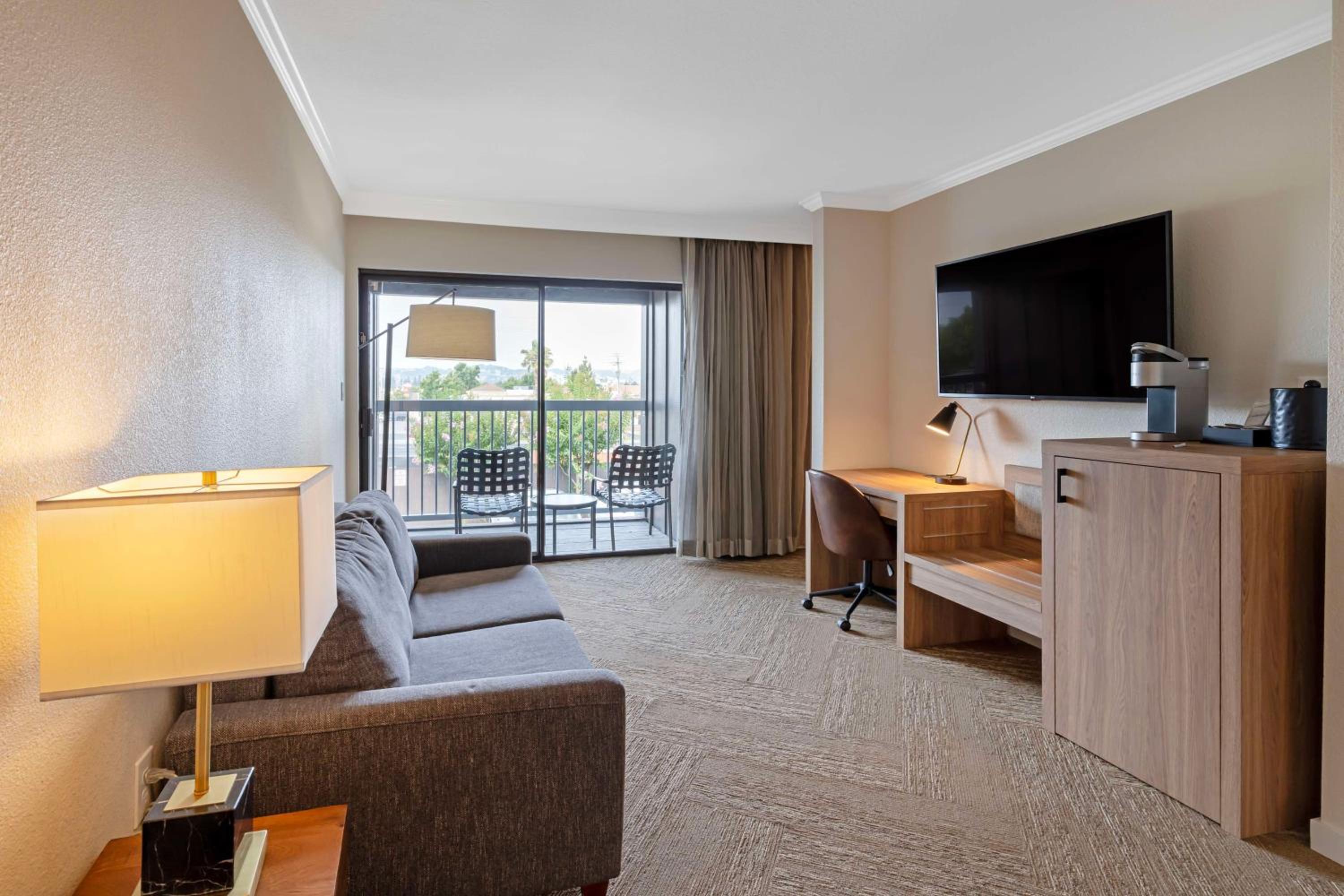 Junior King Suite with Sofa Bed and Walk-In Shower - Interior Entrance/Non-Smoking photo 1
