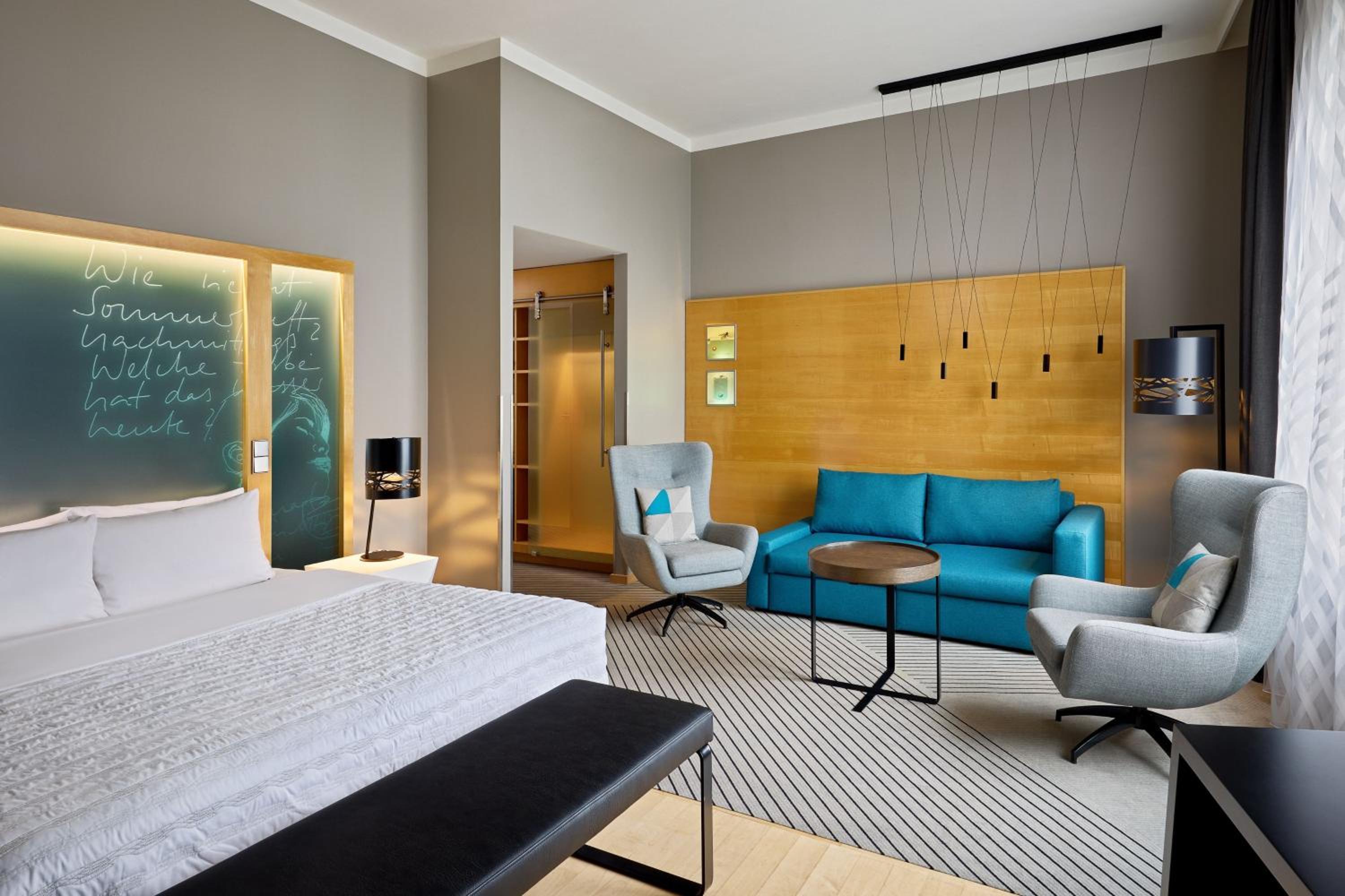Superior Guest Room with Sofa Bed and Courtyard View