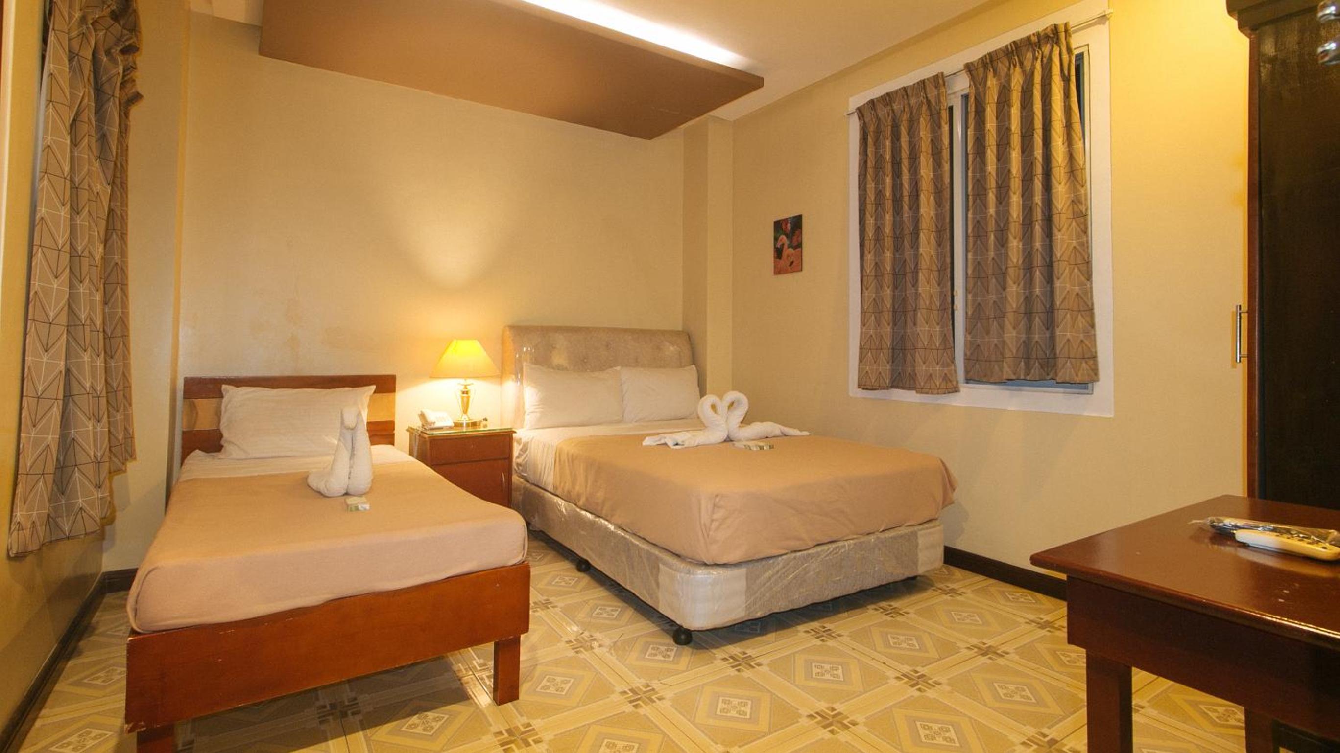 Triple Room - Photo 1