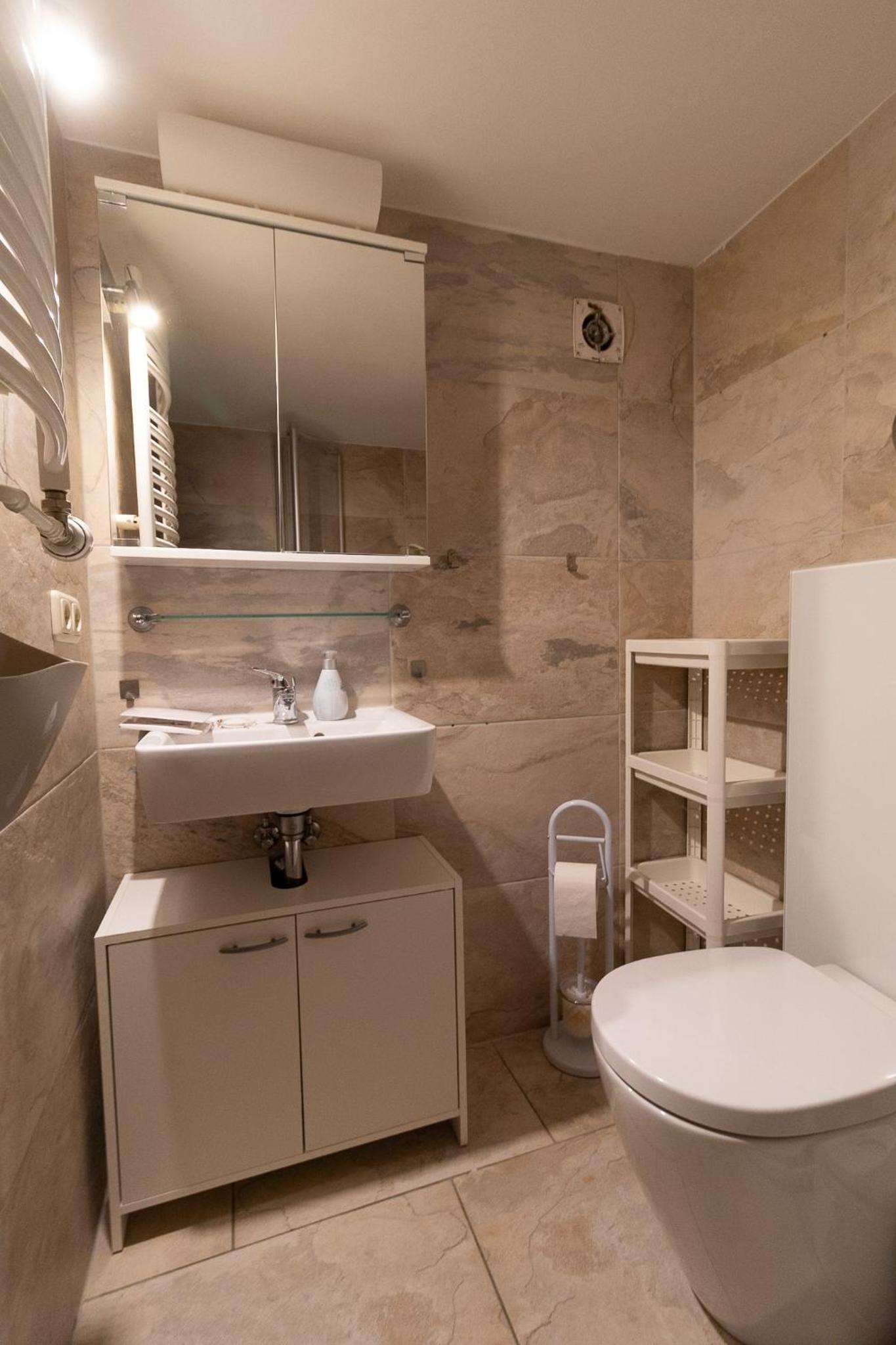 Apartment with Shower - Photo 9