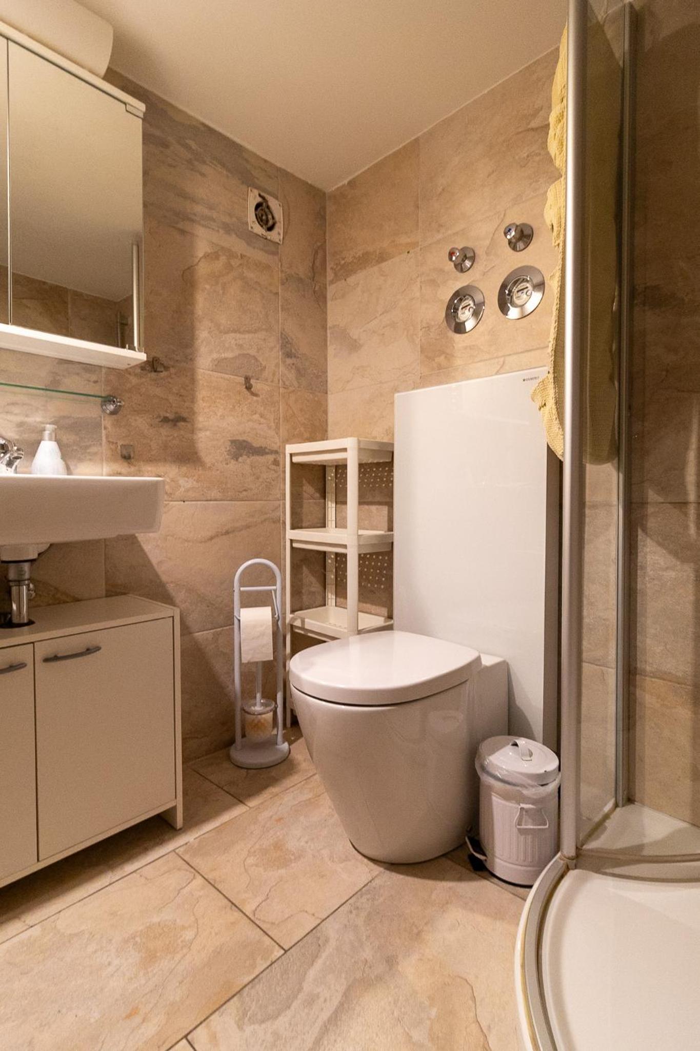 Apartment with Shower - Photo 17