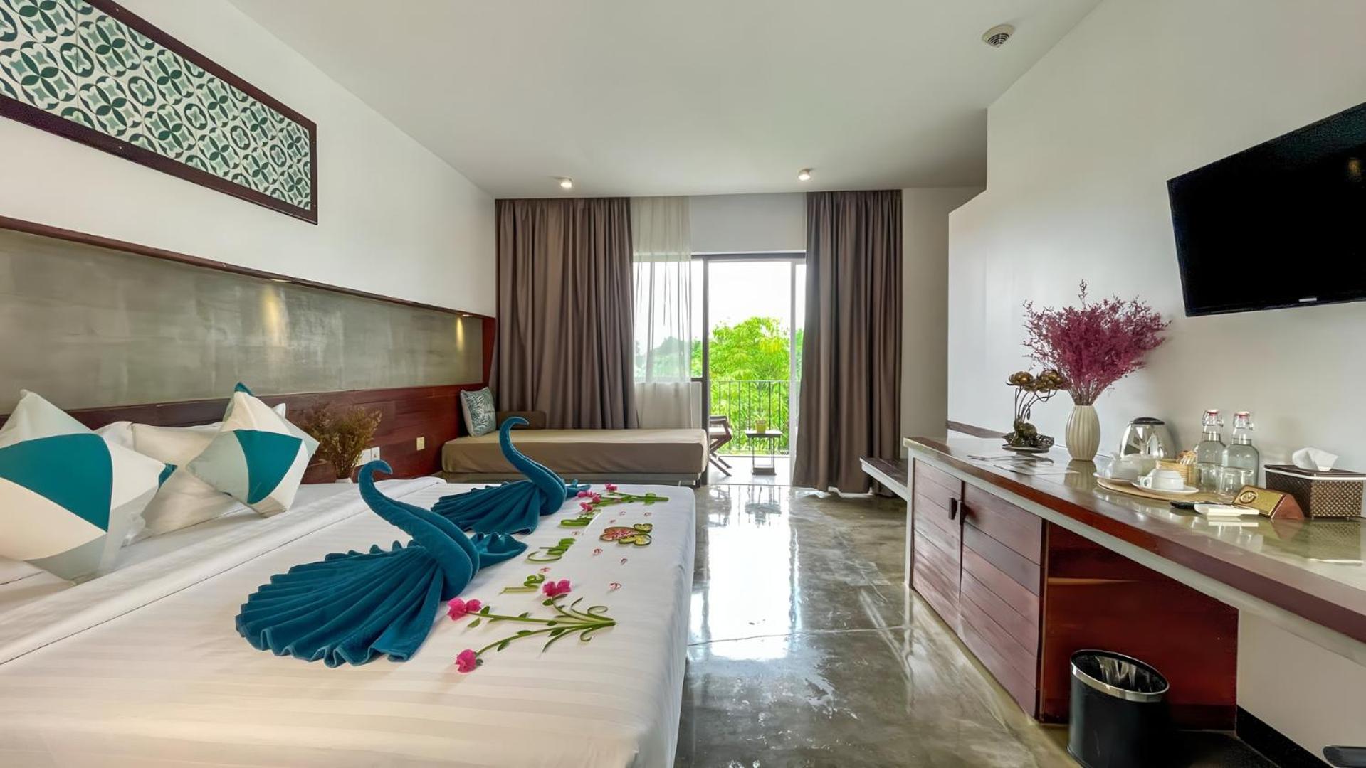 Studio King Pool View with Balcony, Sofa bed, and Bathtub