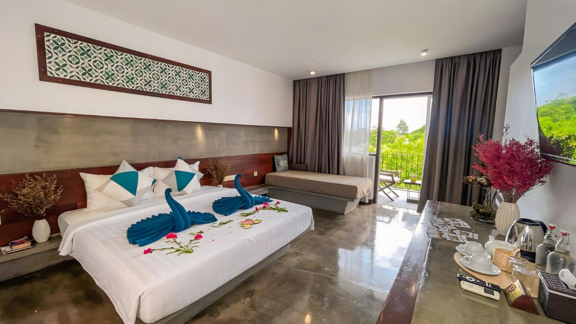 Studio King City View with Bathtub, Sofa bed, and Balcony