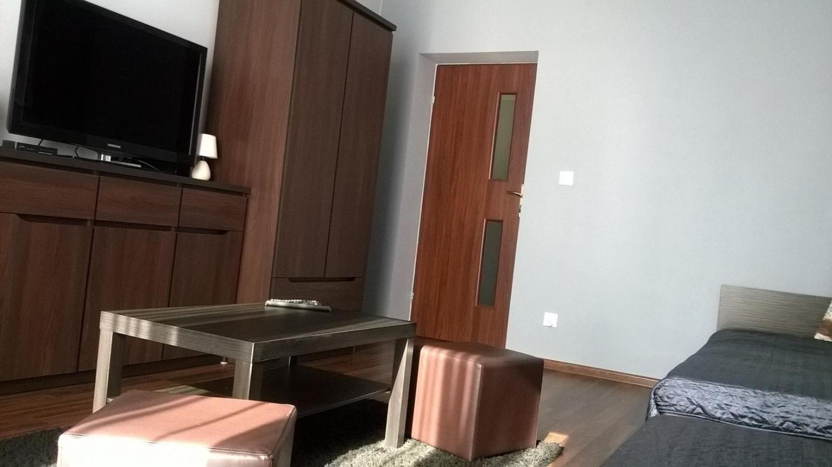 Three-Bedroom Apartment - Photo 2