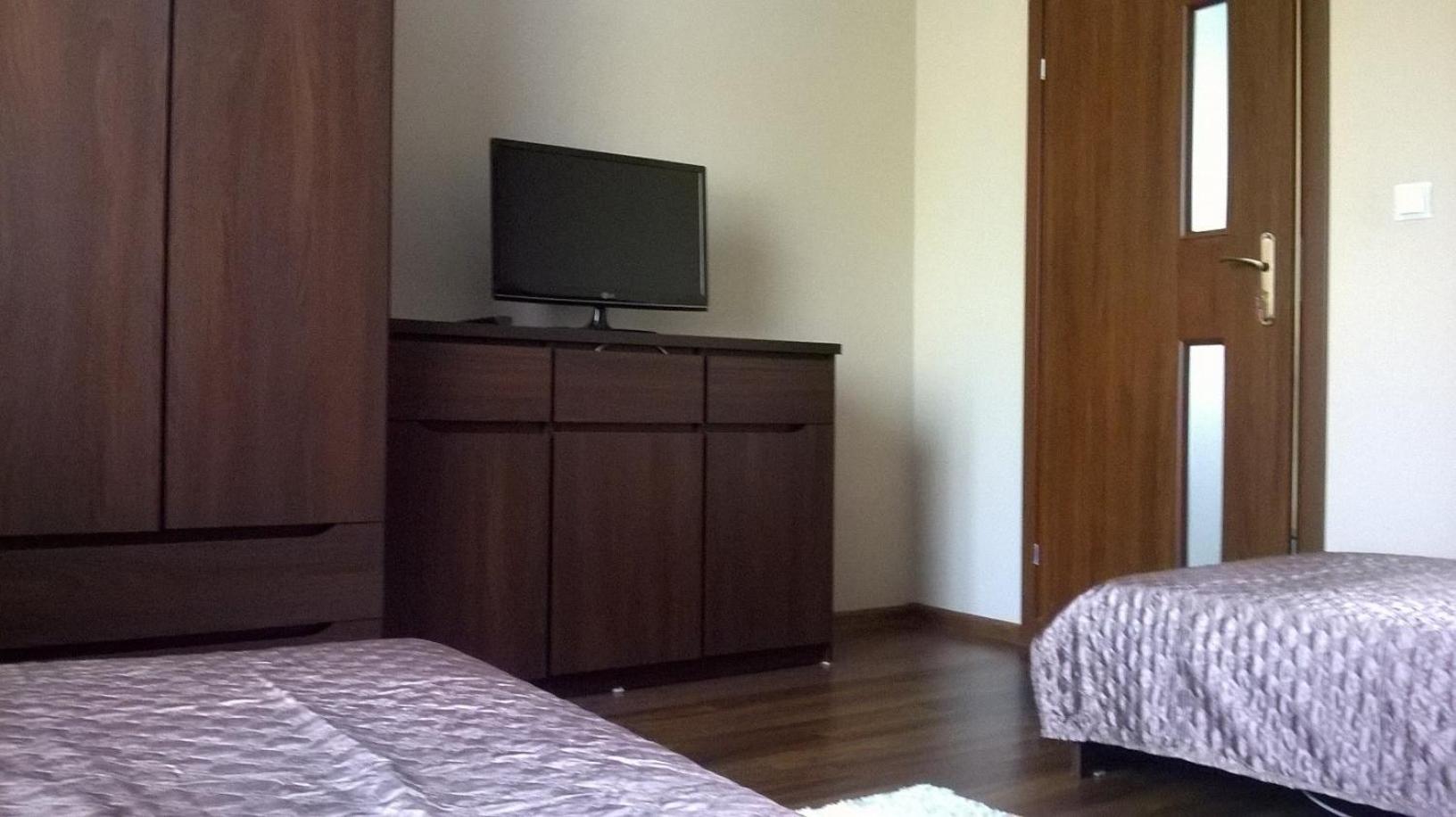 Three-Bedroom Apartment - Photo 10