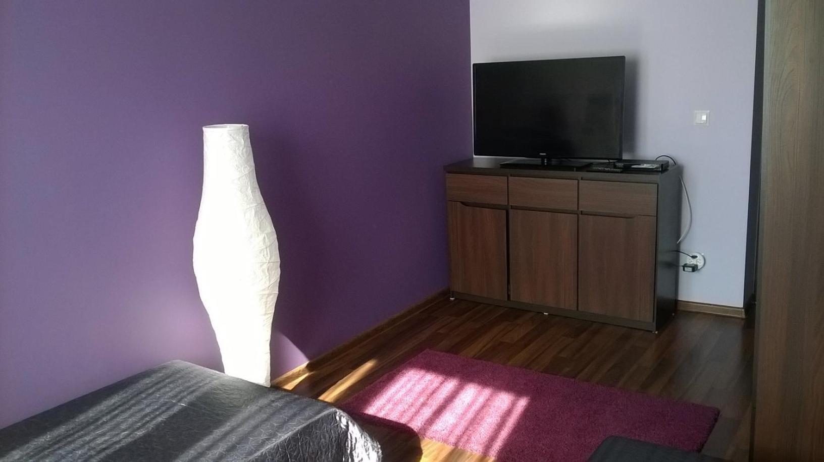 Three-Bedroom Apartment - Photo 12