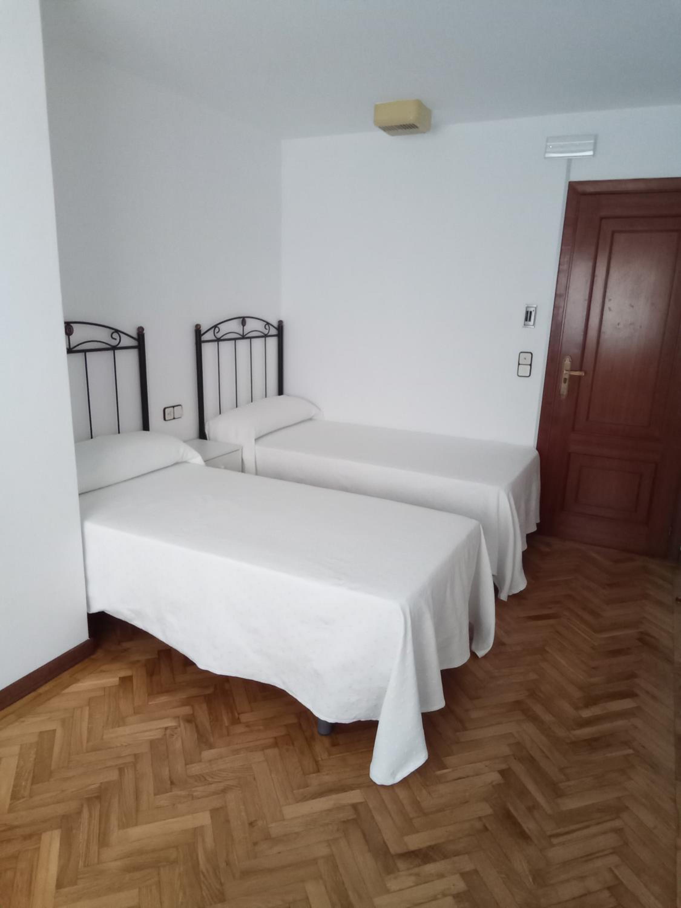 Habitación doble con baño compartido