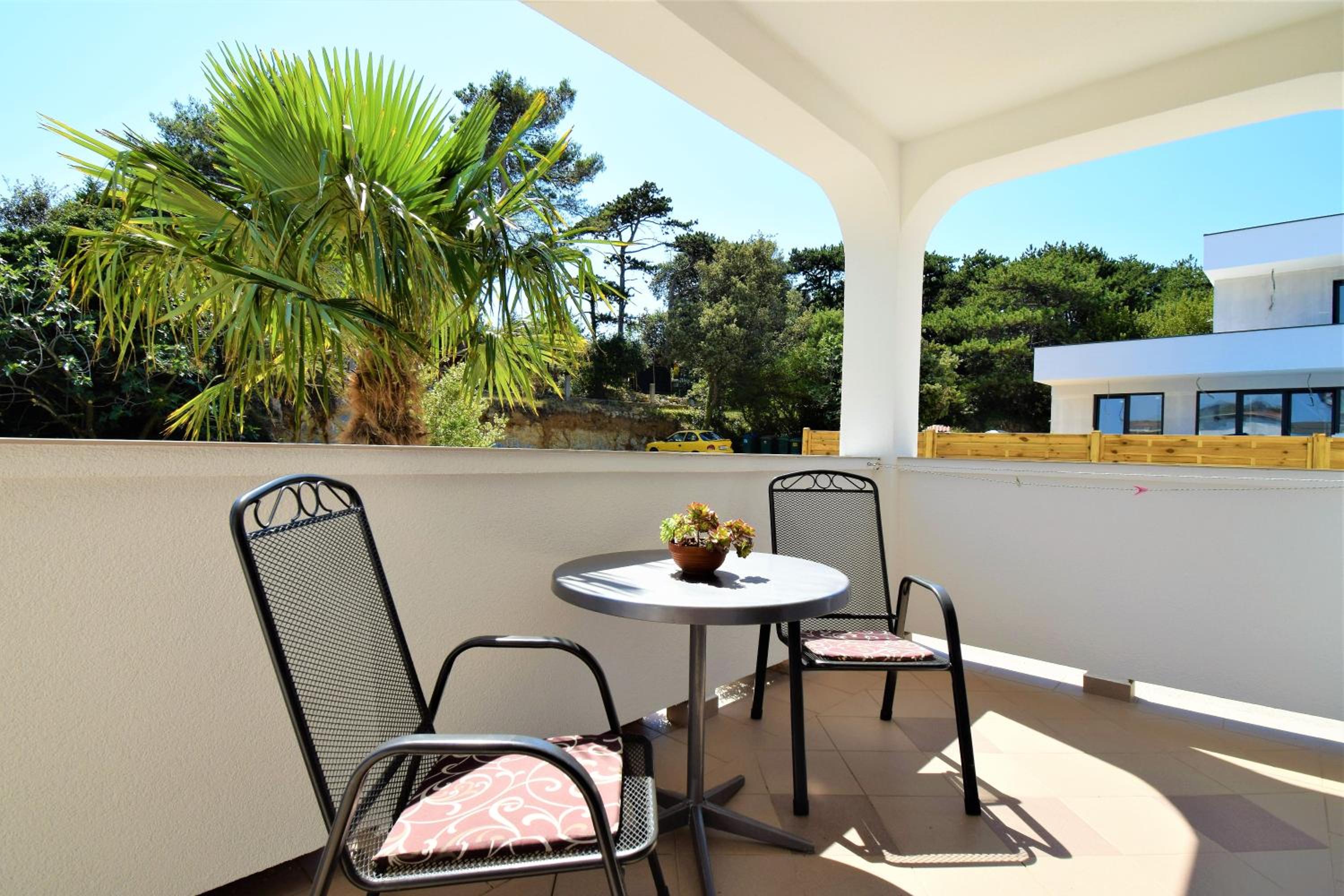 One-Bedroom Apartment with Balcony and Sea View