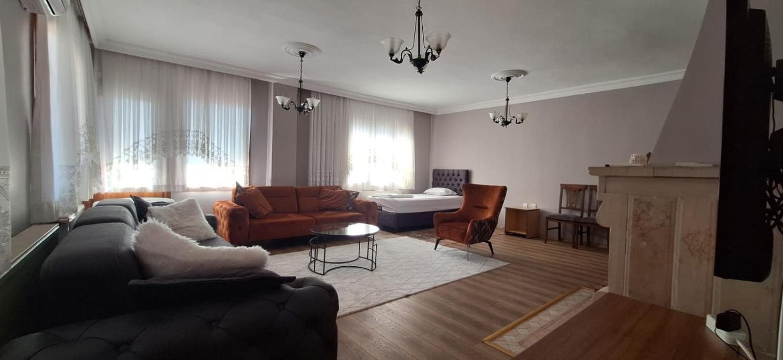 Three-Bedroom Apartment photo 1