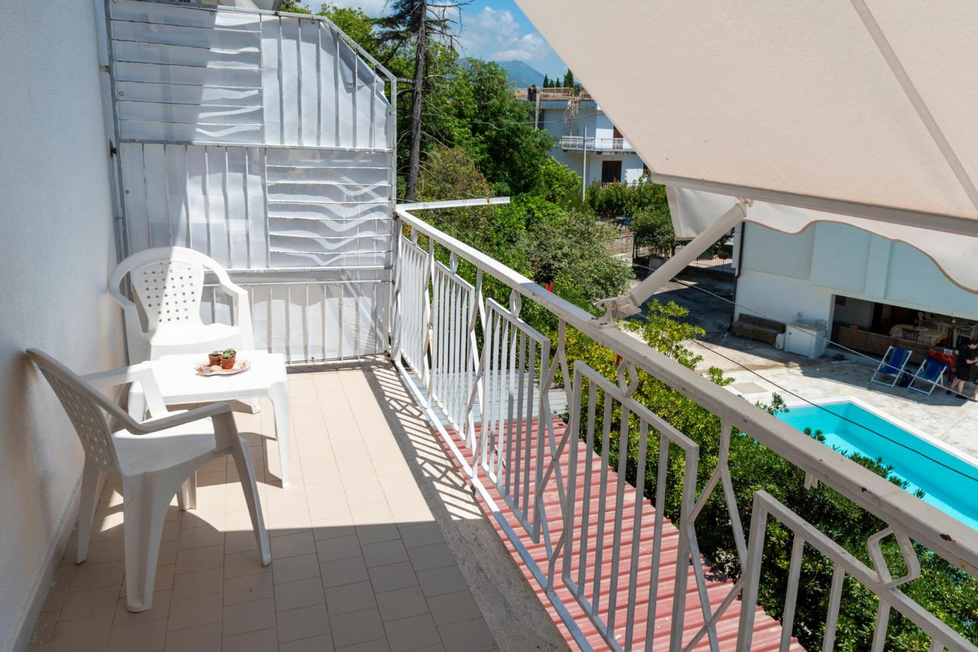 Double Room with Balcony (2 Adults + 1 Child) photo 3