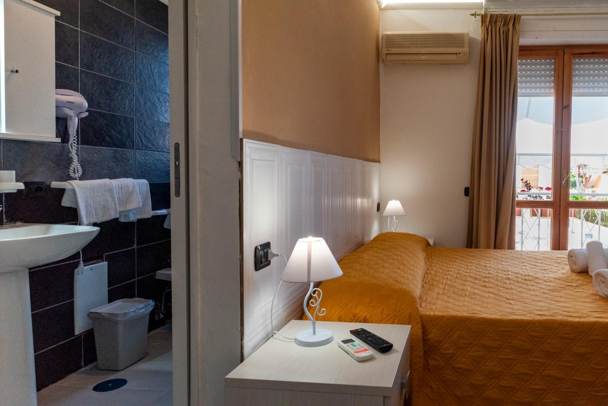 Double Room with Balcony (2 Adults + 1 Child) photo 1