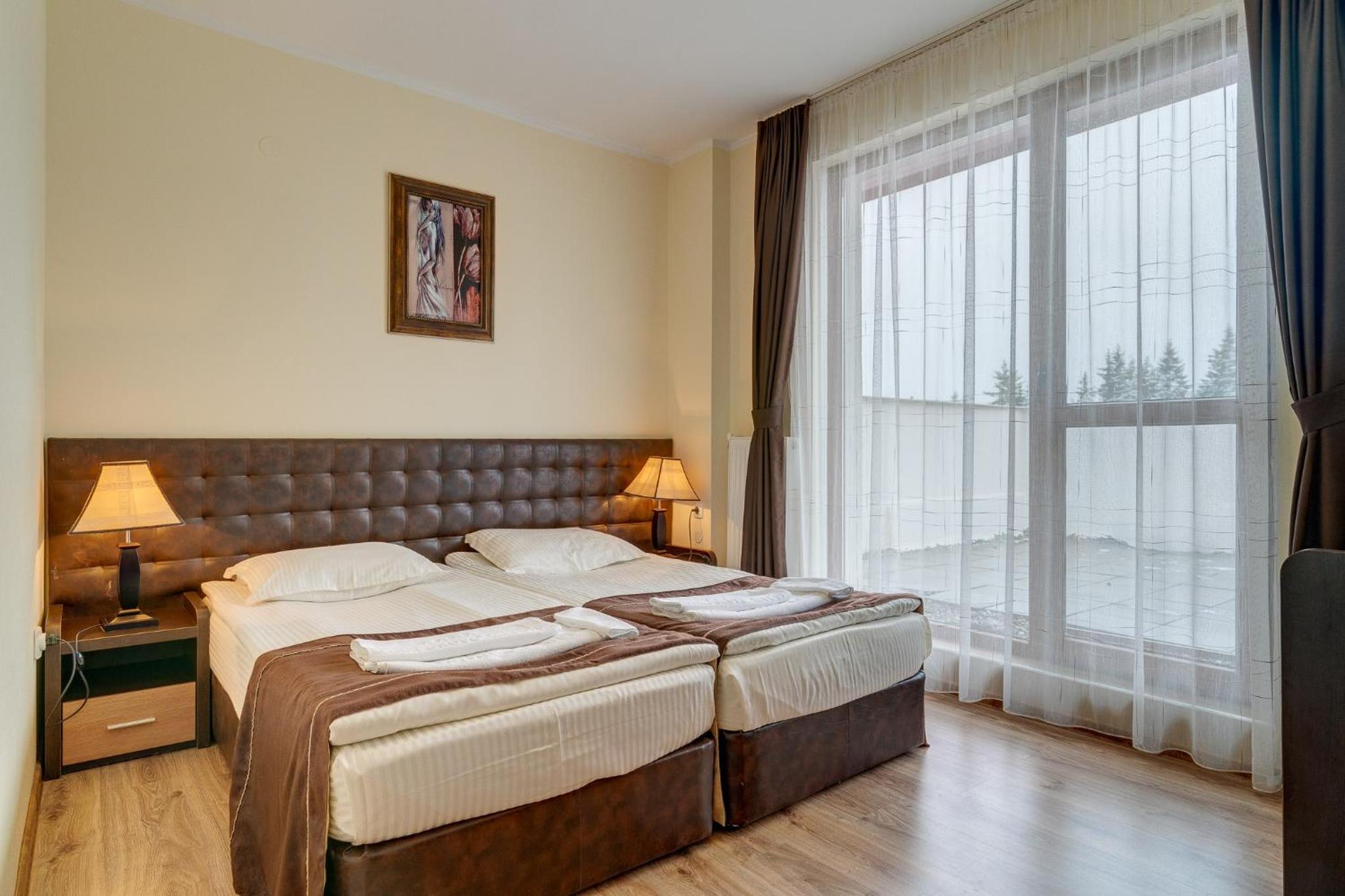 Three-Bedroom Apartment - Photo 2