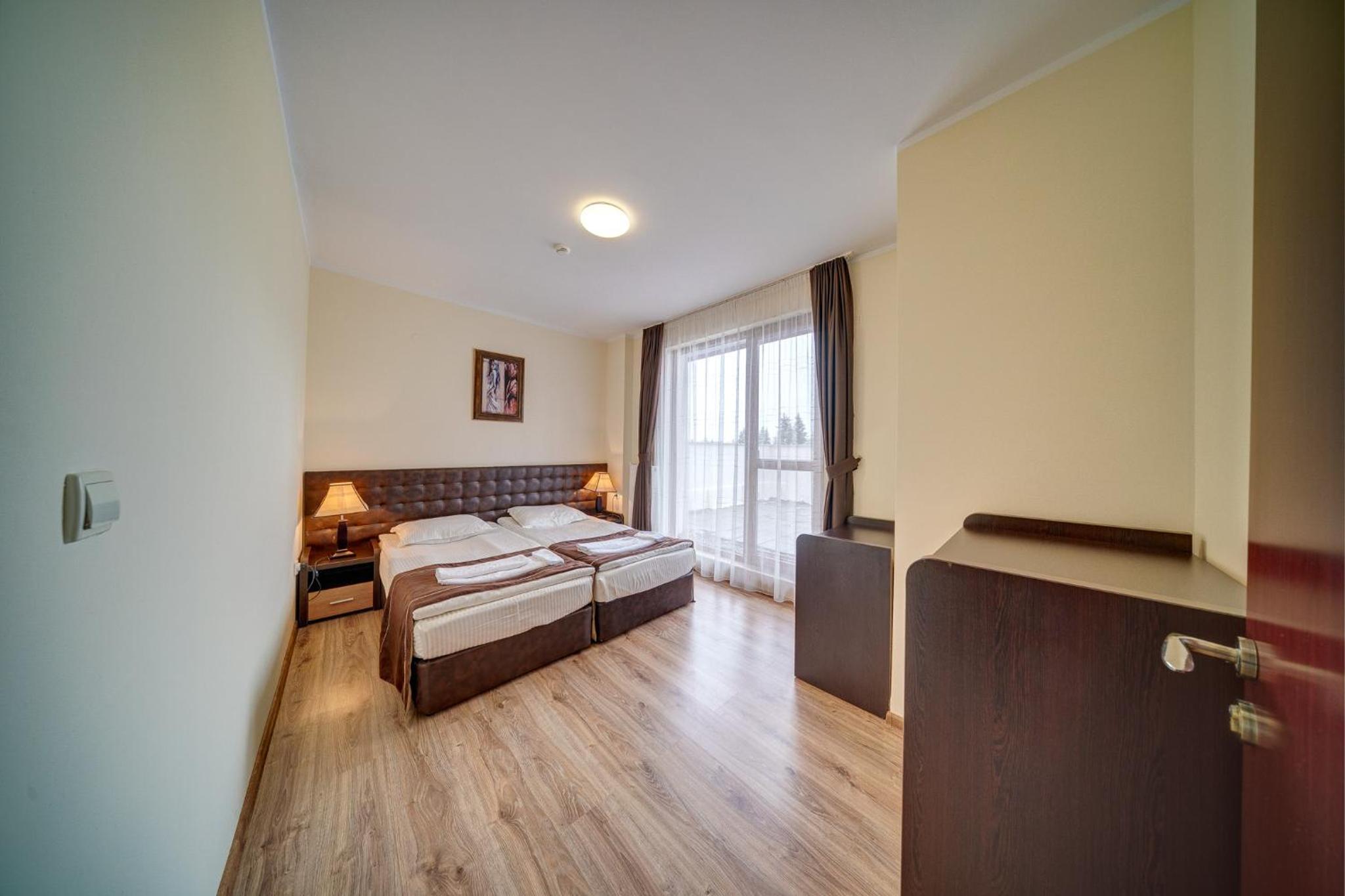 Three-Bedroom Apartment - Photo 3