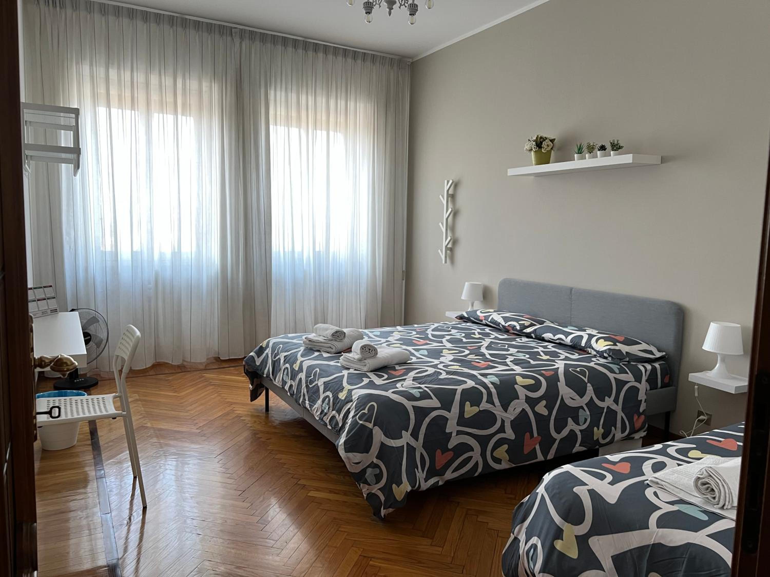 Queen Room with Shared Bathroom