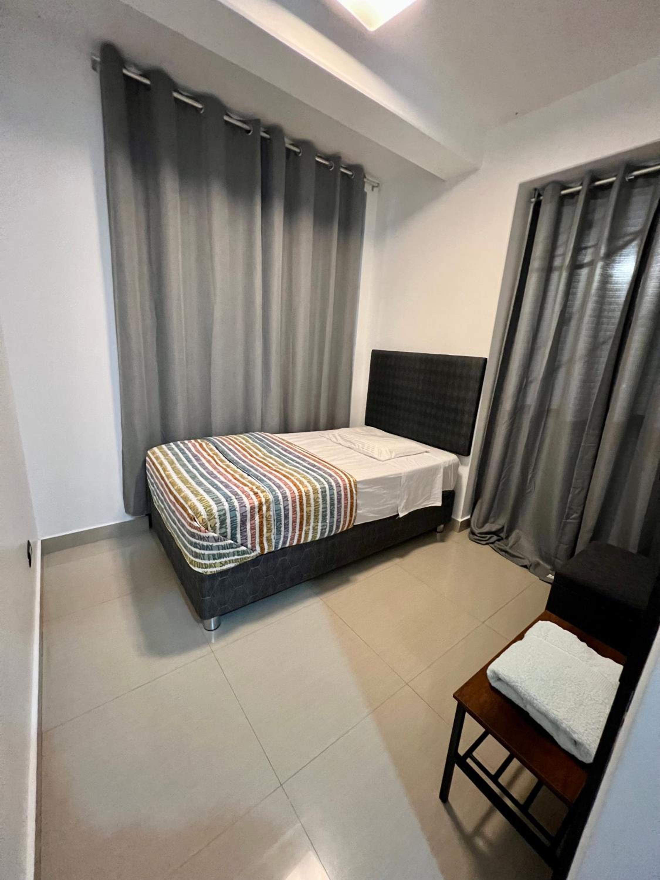 Three-Bedroom Apartment photo 1