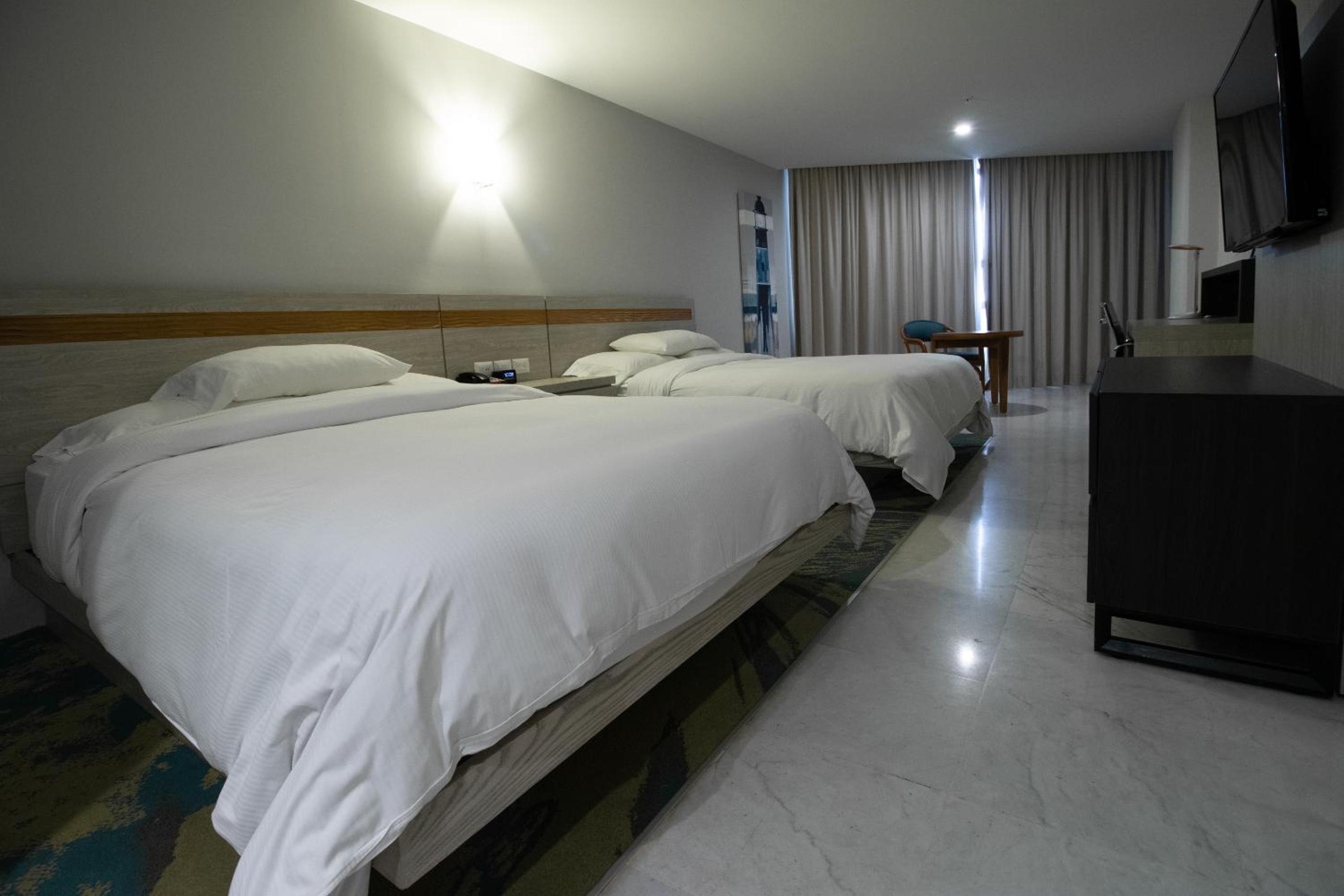 Double Room with Two Double Beds and Beach View