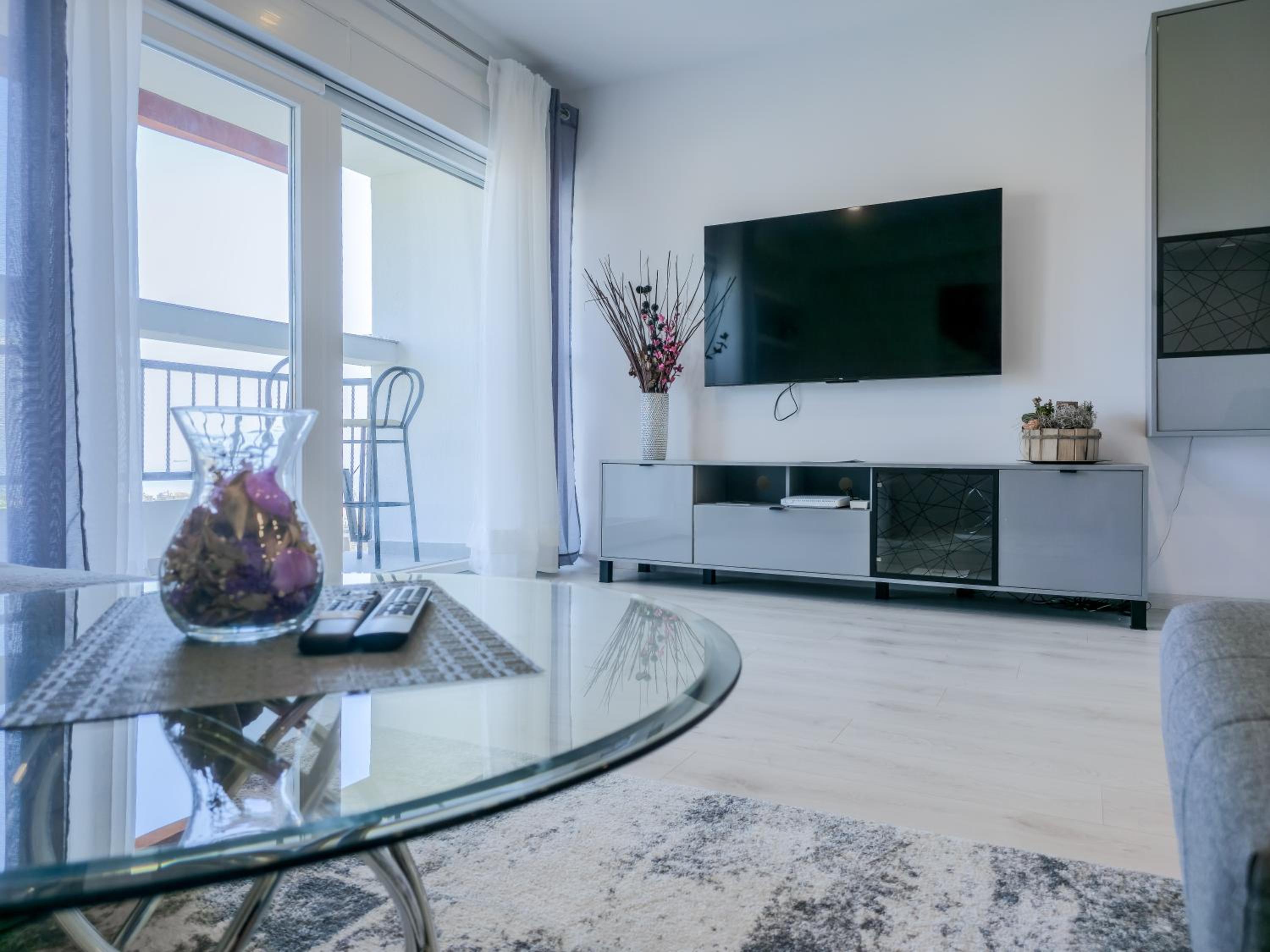 One-Bedroom Apartment with Balcony and Sea View