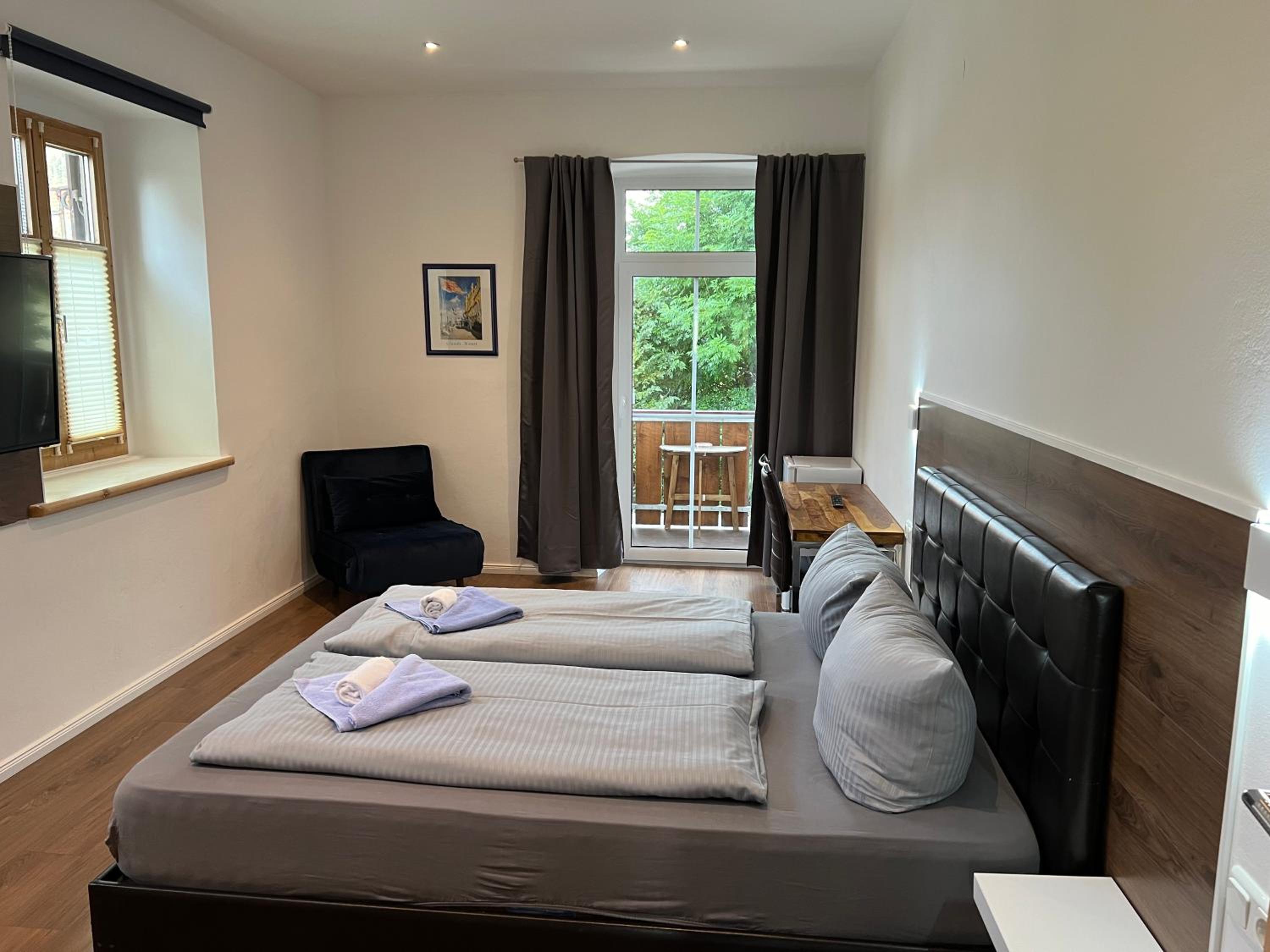 Family Room with Balcony - Photo 1