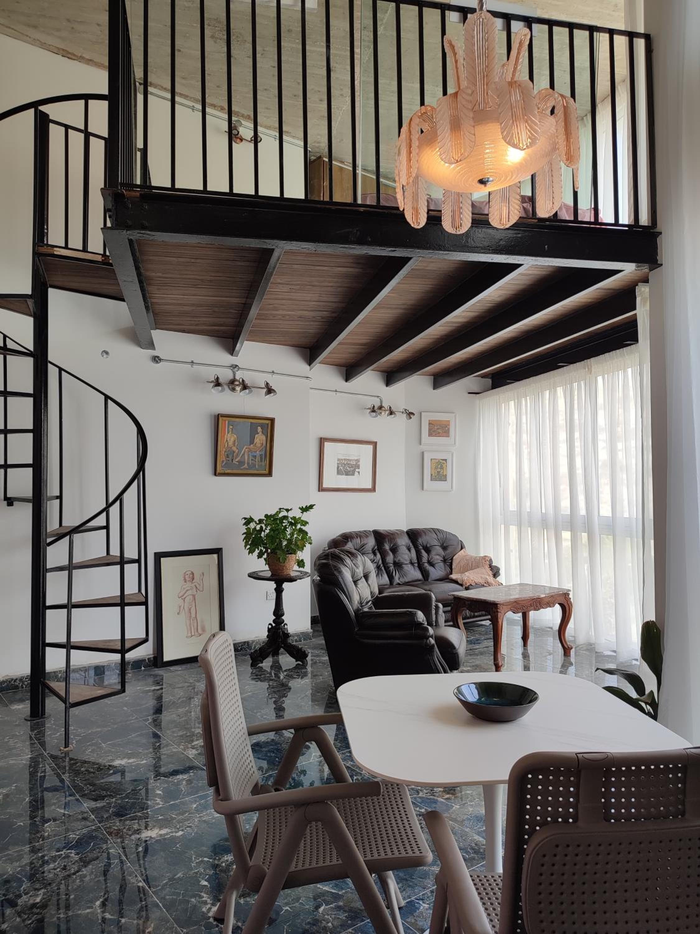 One-Bedroom Loft Apartment with Balcony