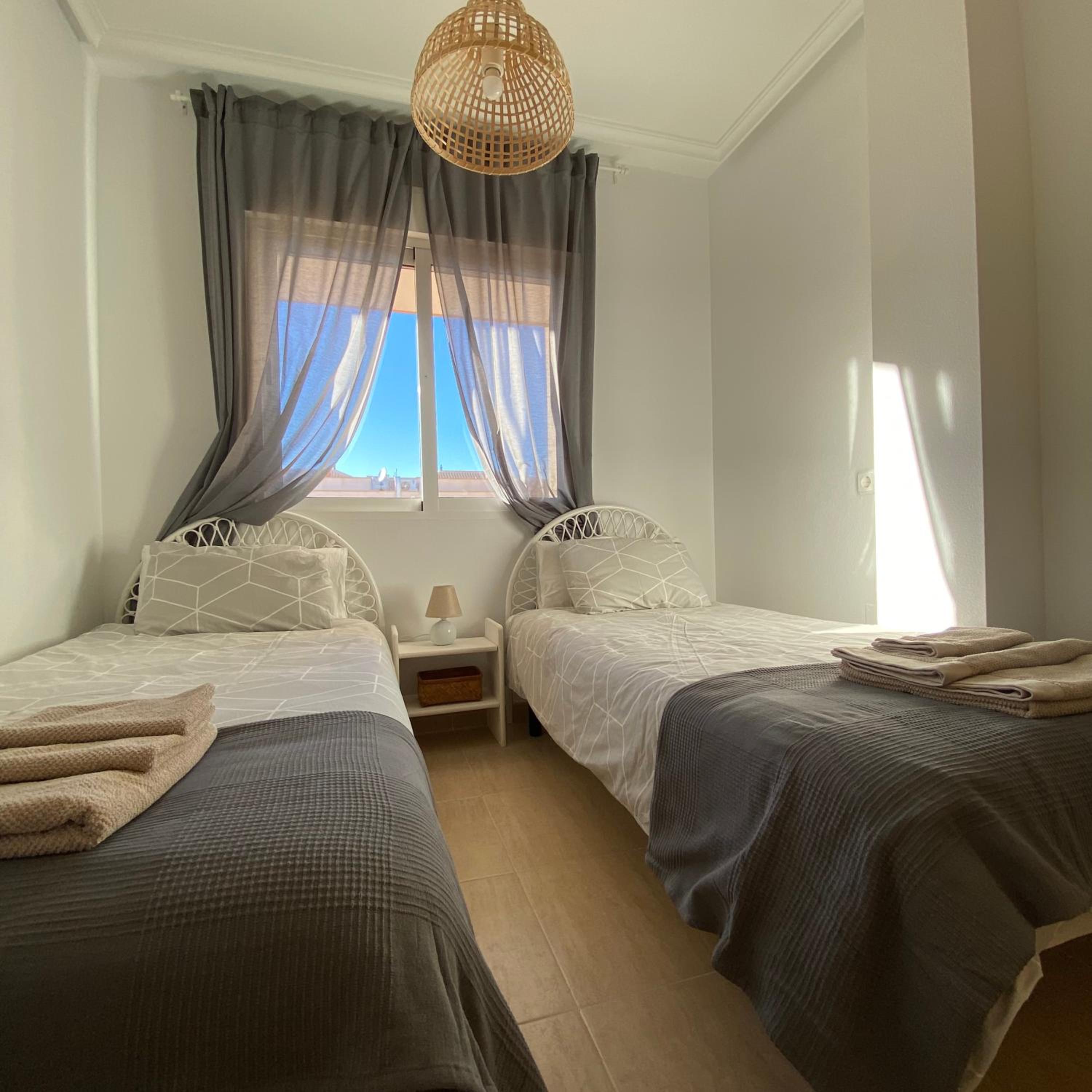 Apartamento de dos habitaciones con balcón y terraza