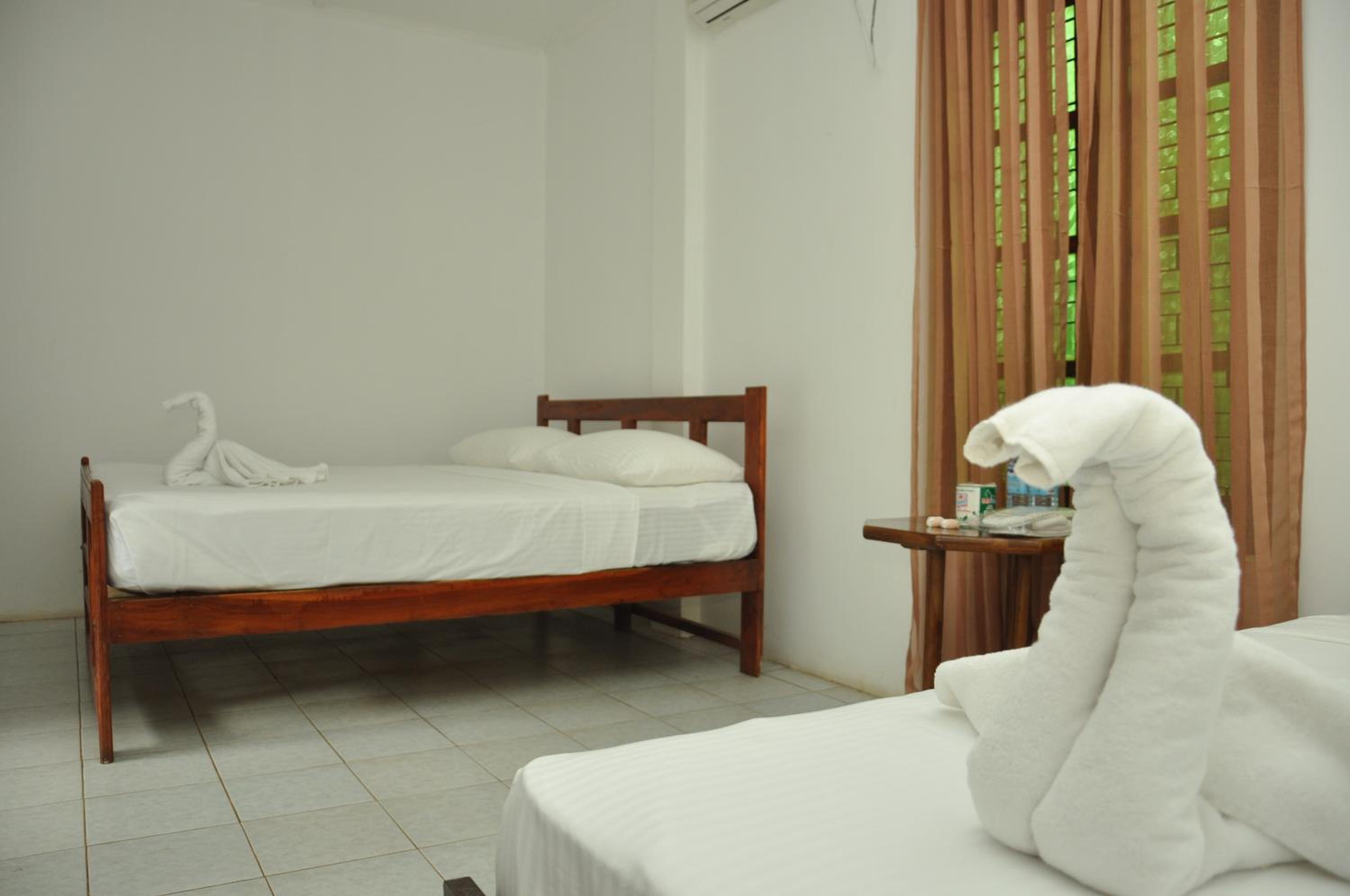 Deluxe Triple Room with Garden View photo 3