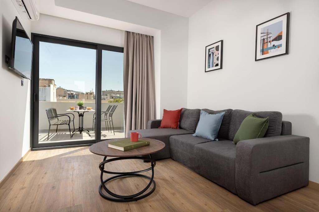 One-Bedroom Apartment with Balcony and City View