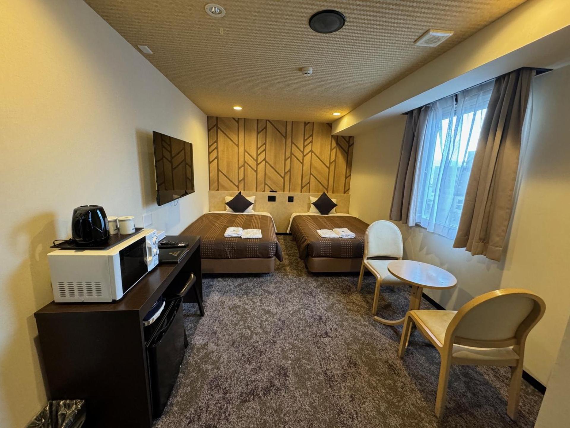Twin Room - Non-Smoking - Photo 1