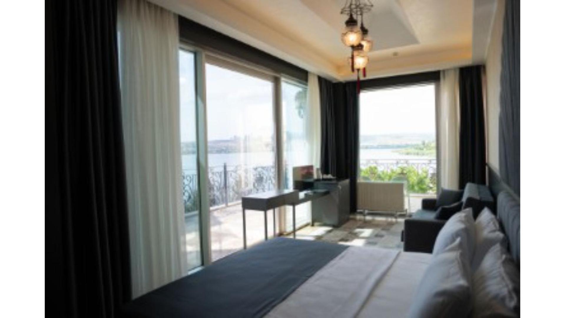 Deluxe Double Room with Balcony - Photo 2