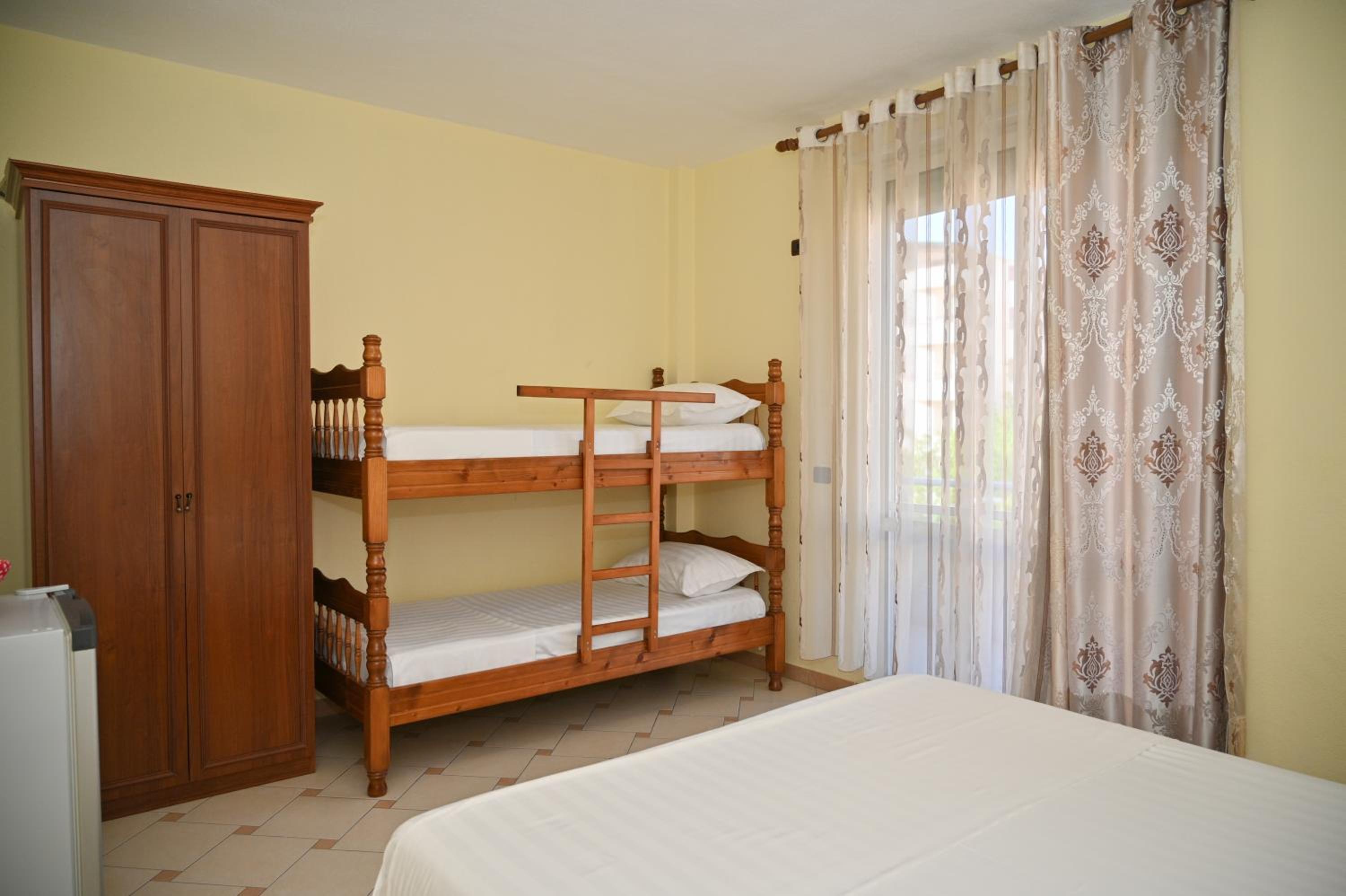 Quadruple Room with Balcony photo 1