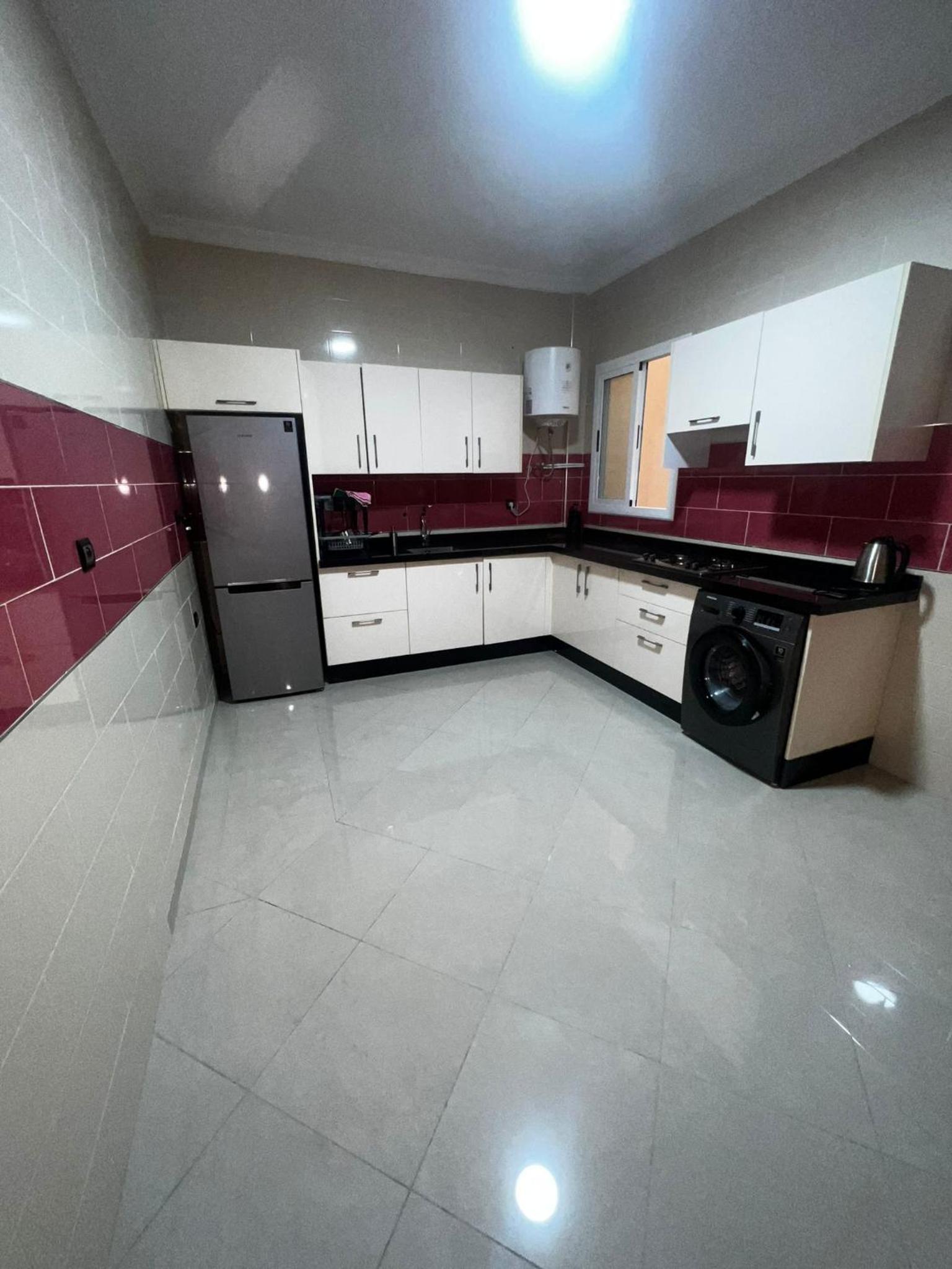 Three-Bedroom Apartment photo 2
