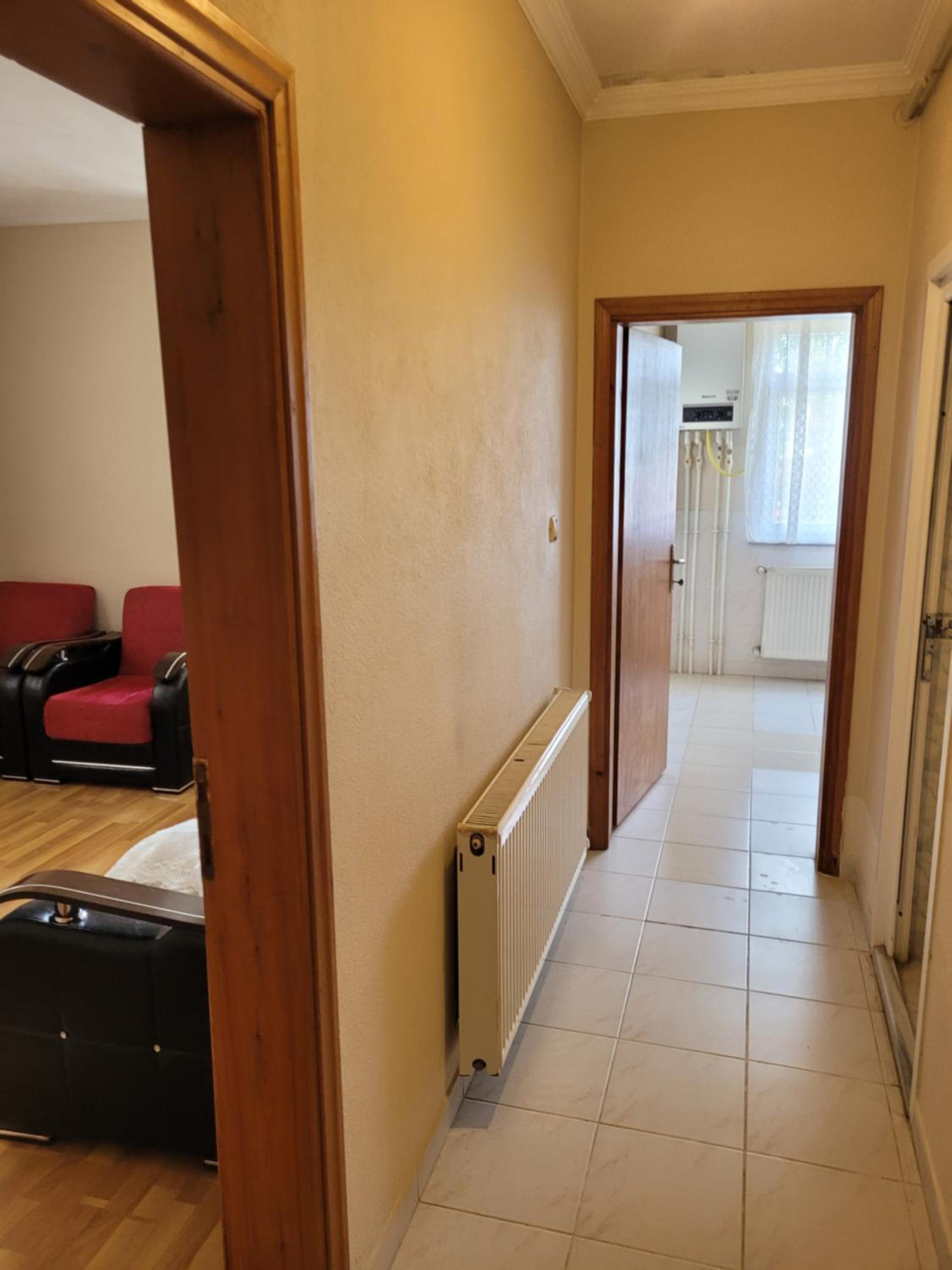 Three-Bedroom Apartment photo 1