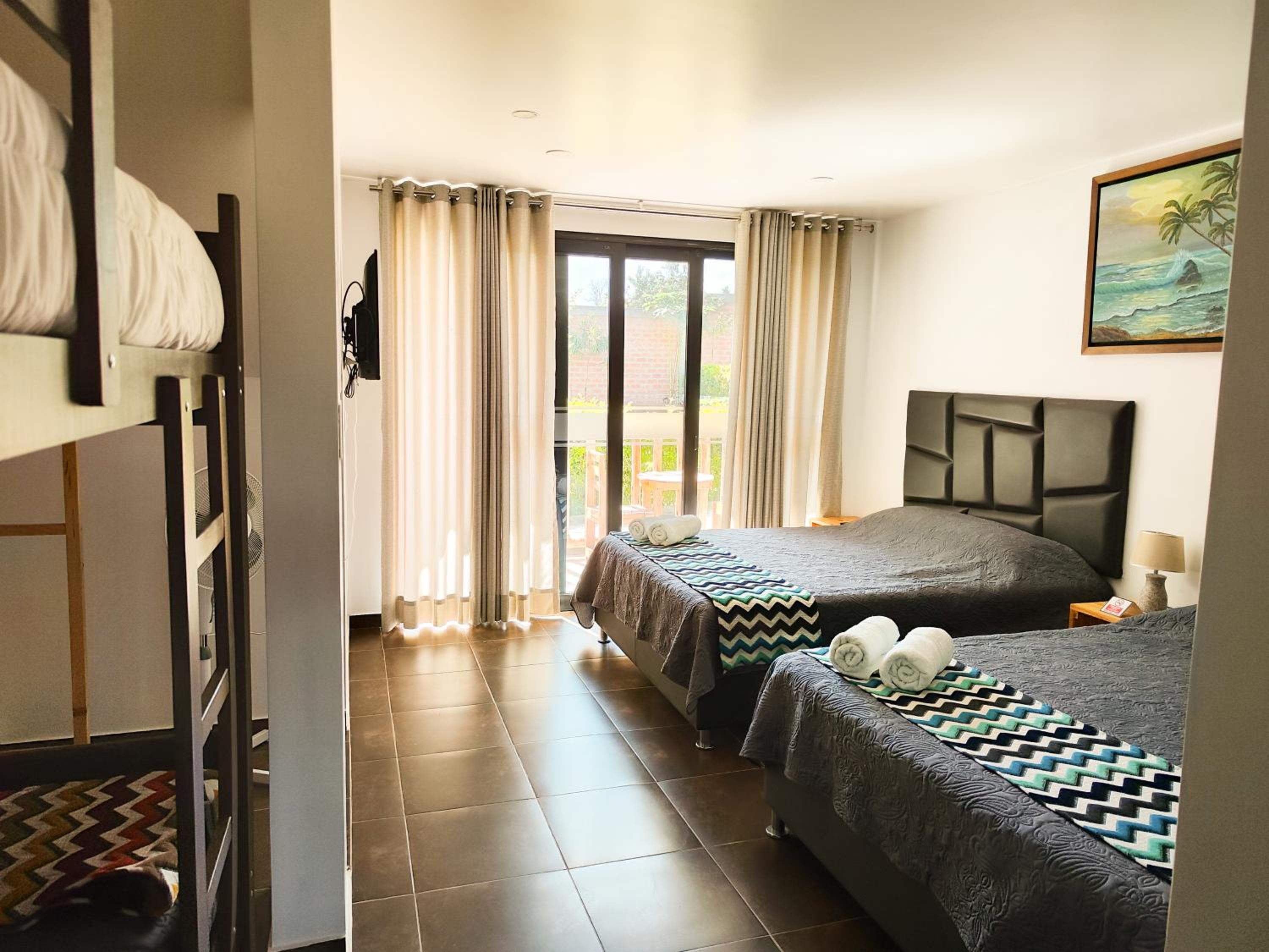 Family Room with Balcony - Photo 3