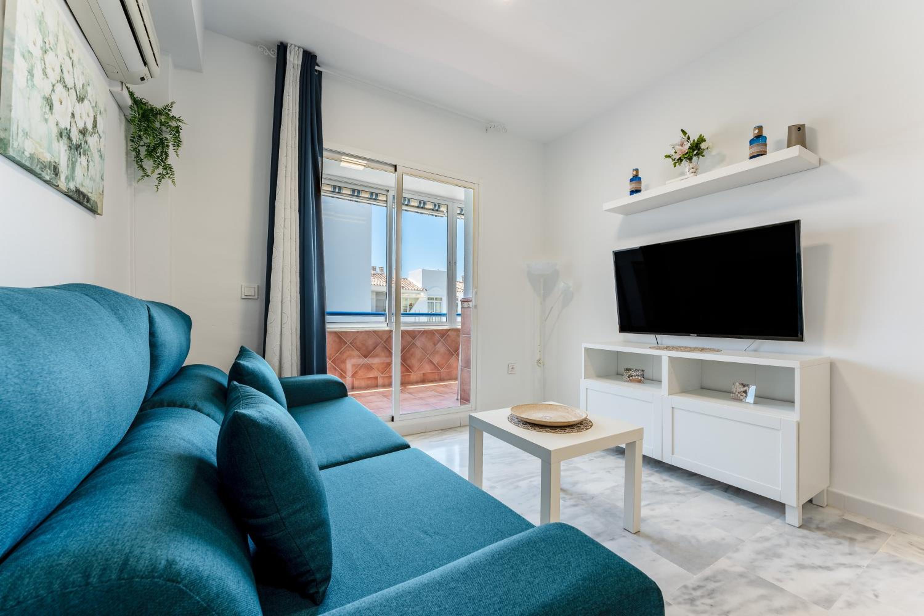Apartamento de un dormitorio superior con balcón
